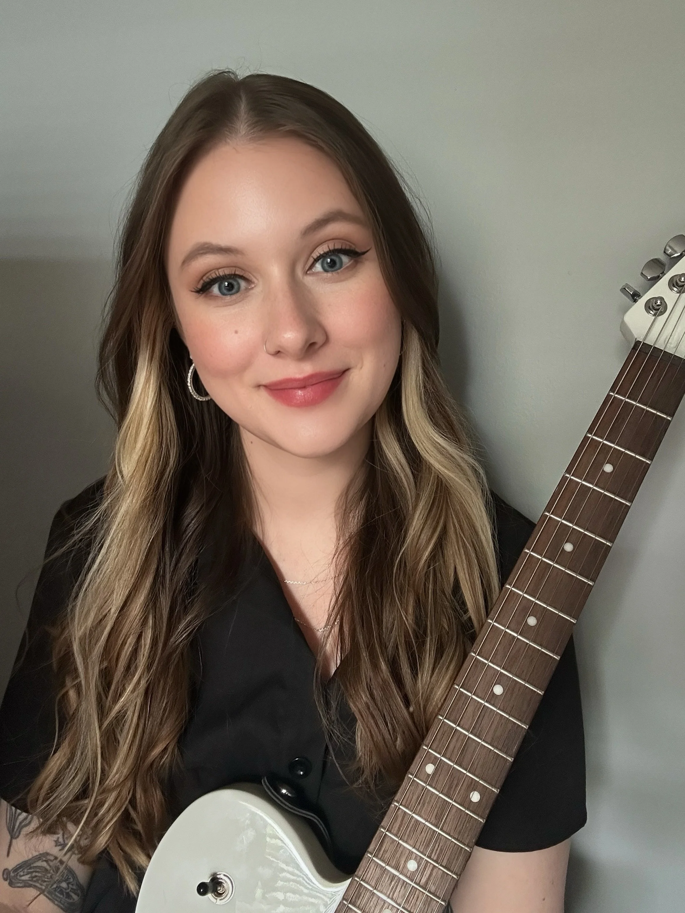 Headshot of Caroline Wood.