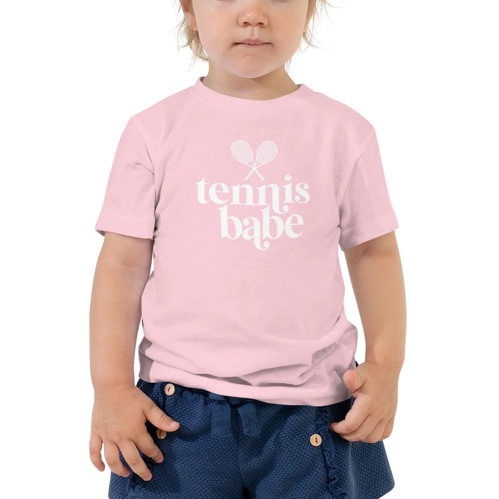 toddler-staple-tee-pink-front-62d980720ffd4.jpg