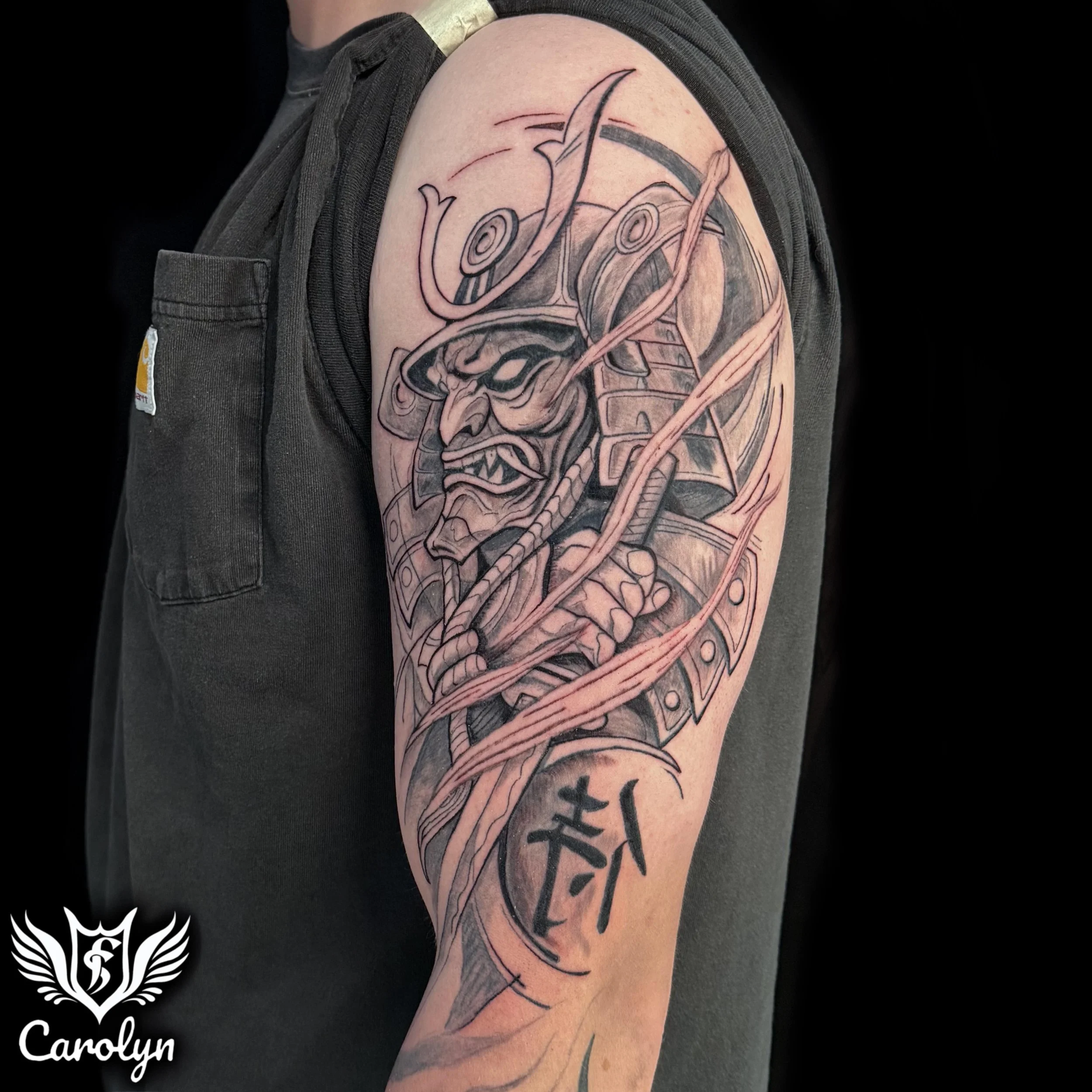Black and grey Japanese Samurai tattoo by Carolyn-min.jpg
