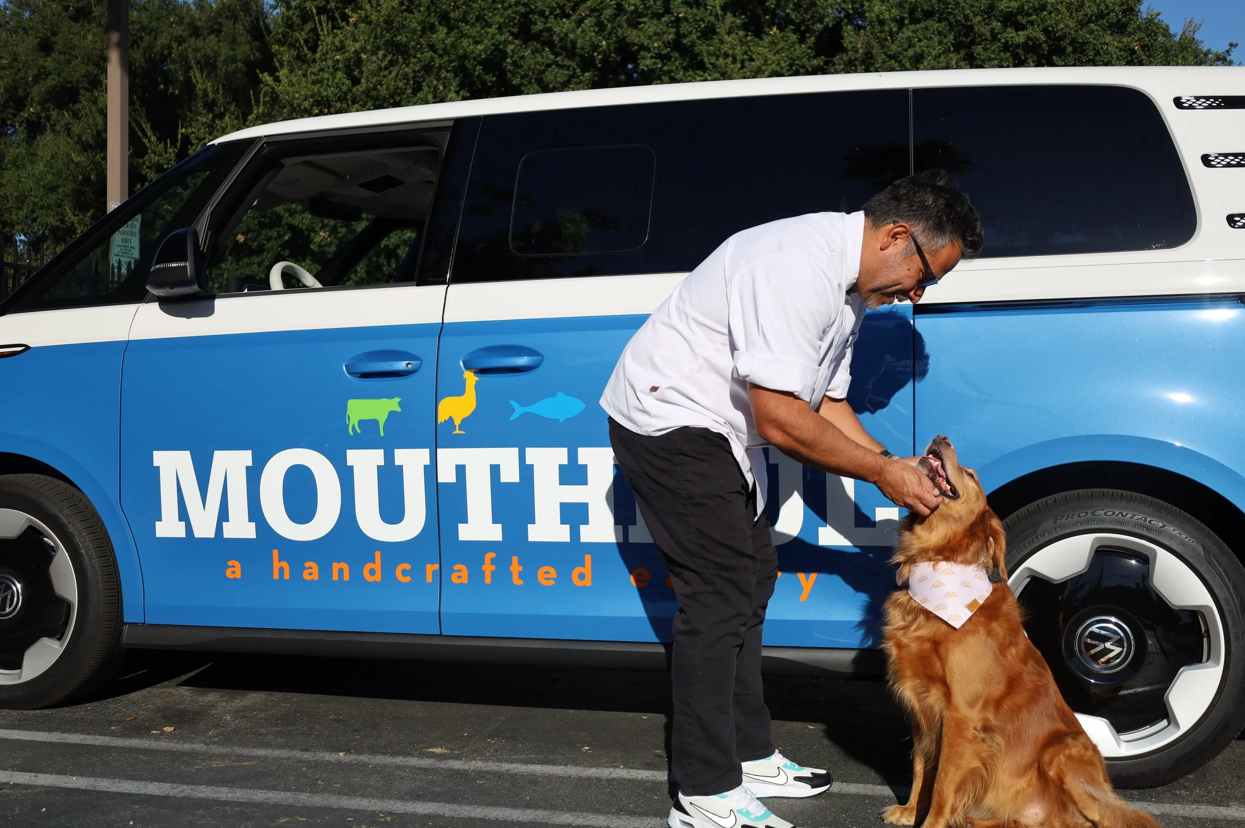 Chef Luis Sanchez and Denver with our Mouthful Eatery VW bus!