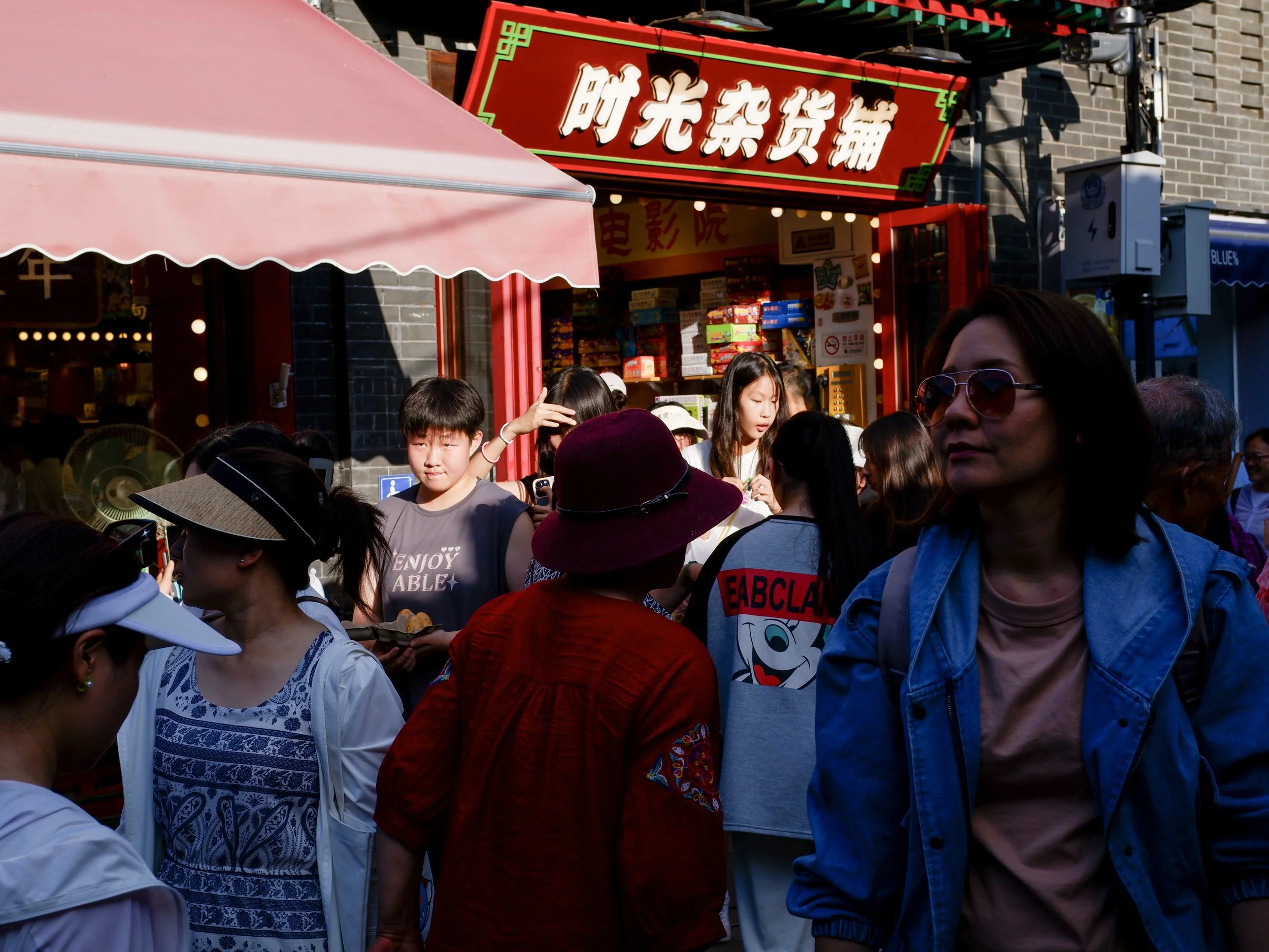 Shoppers in Nanluoguxiang hutong.