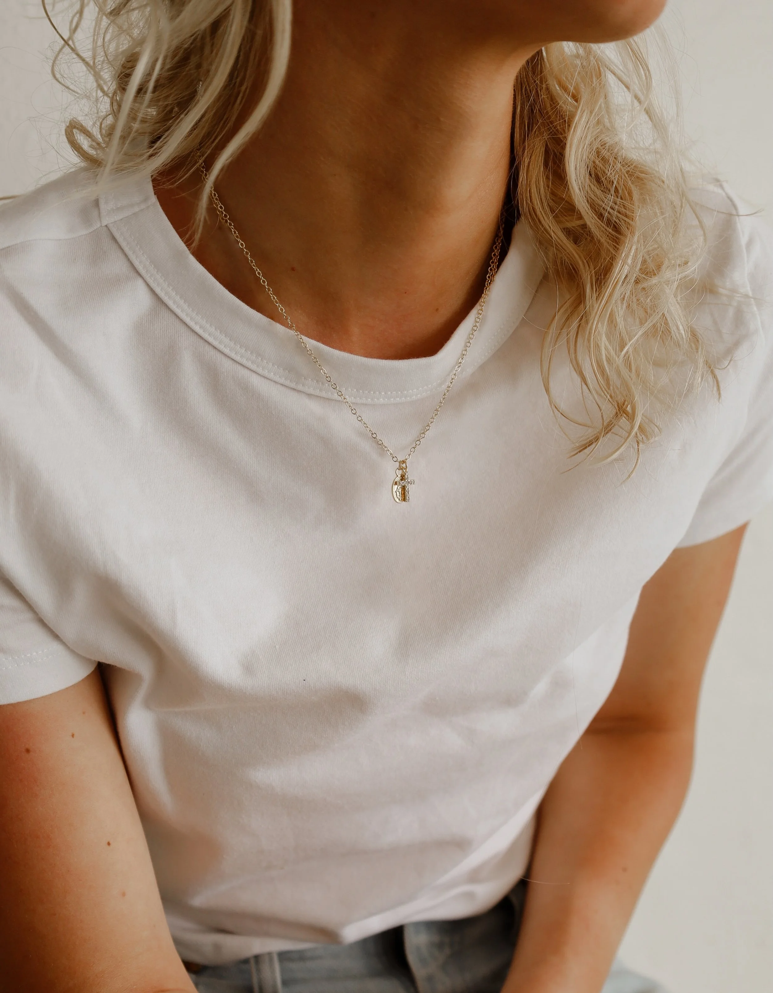 Our Virgin Mary + Cross Necklaces are back in stock in both small &amp; large pendants 🪽🔒