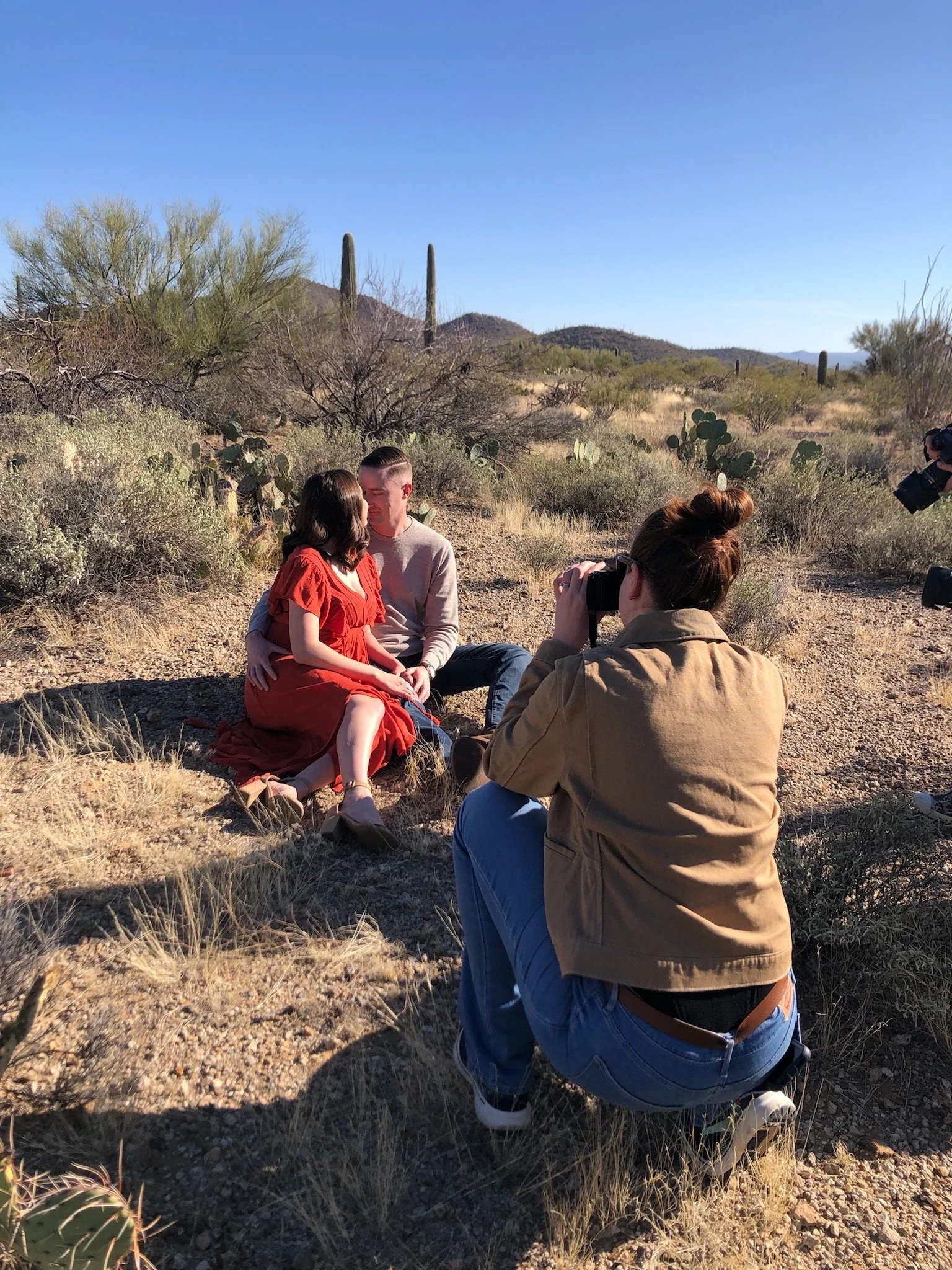 Megan Steele photographs a couple kissing in the desert.