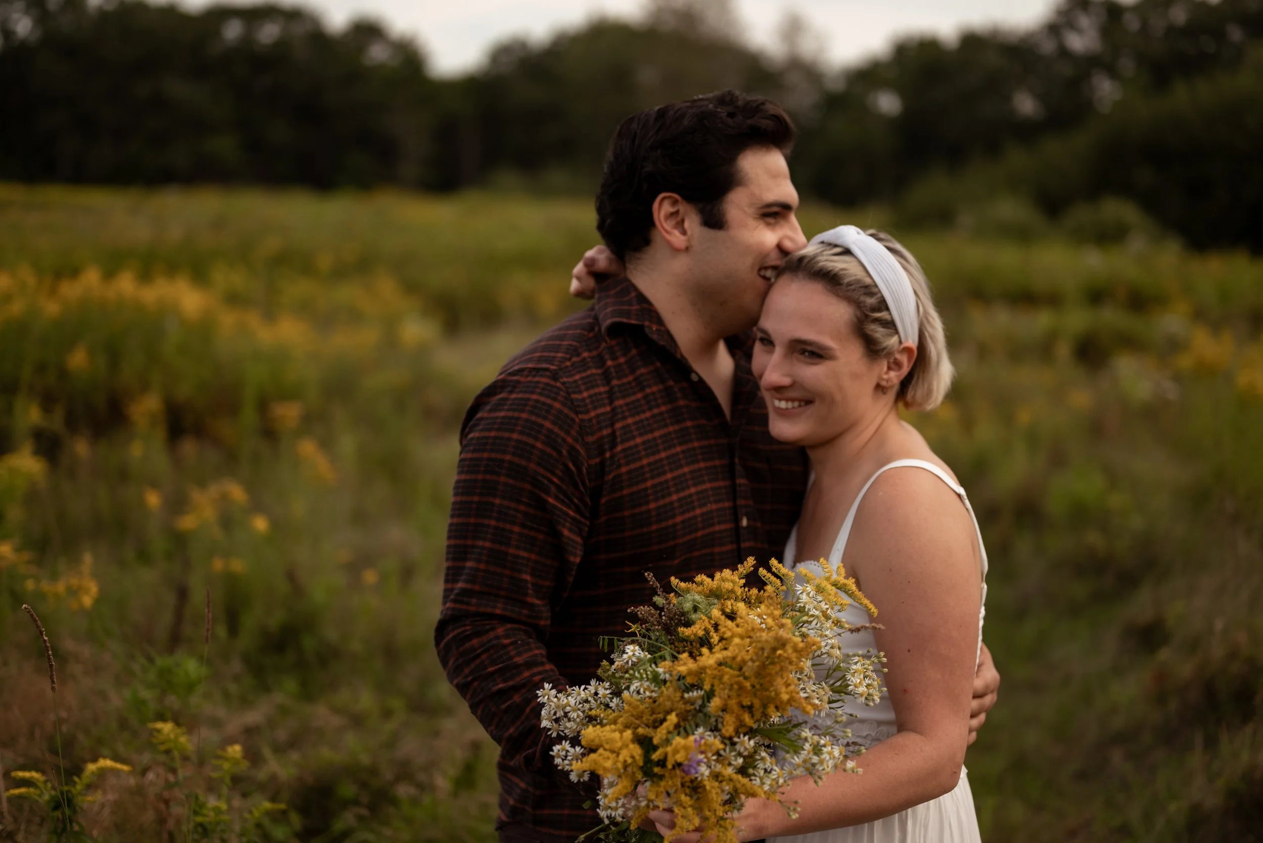 A fall adventure elopement a field of wildflowers