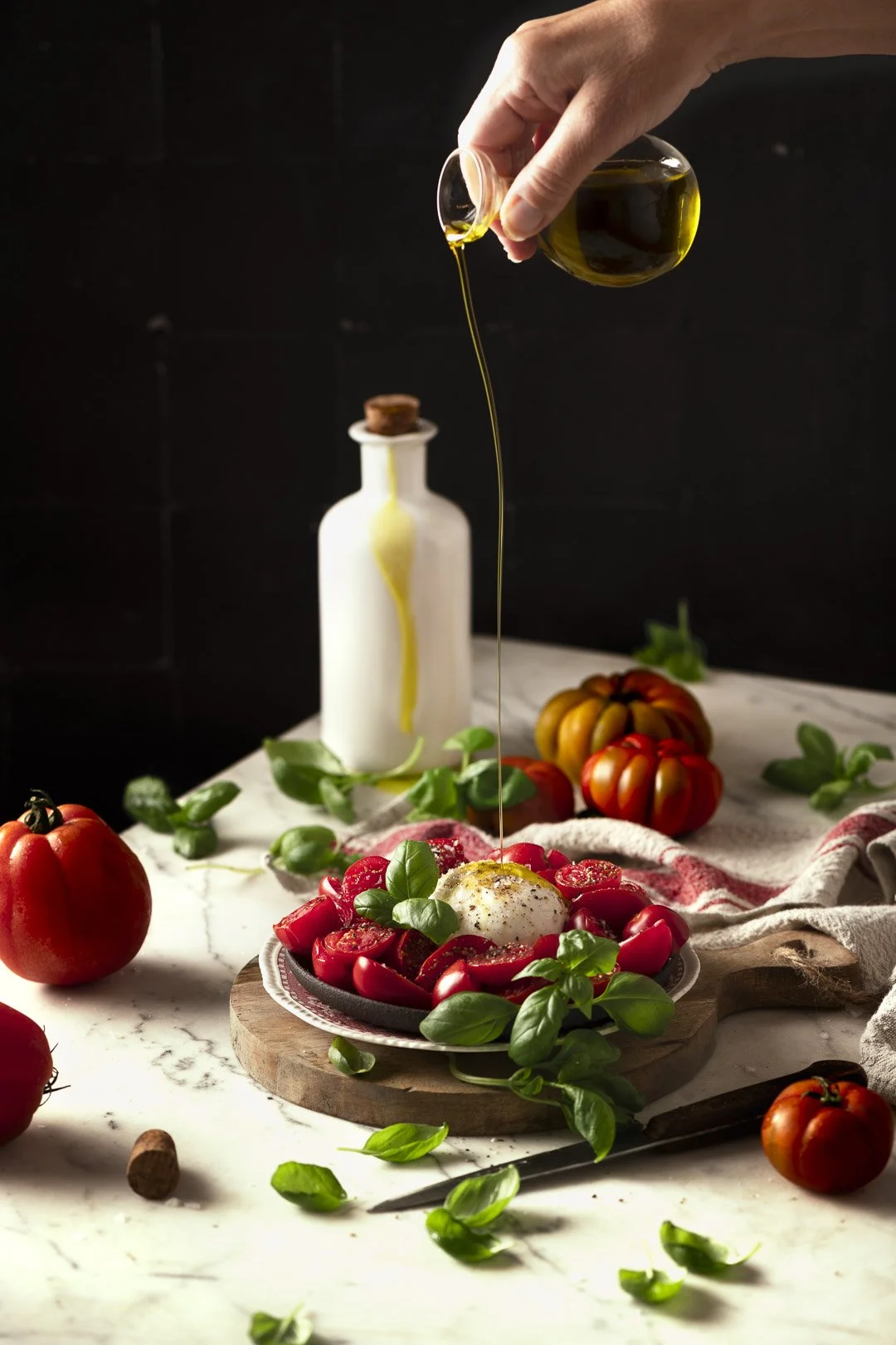 caprese salad, mozzarella, burrata, cheese, typical italian, basil hand, salt, olive oil