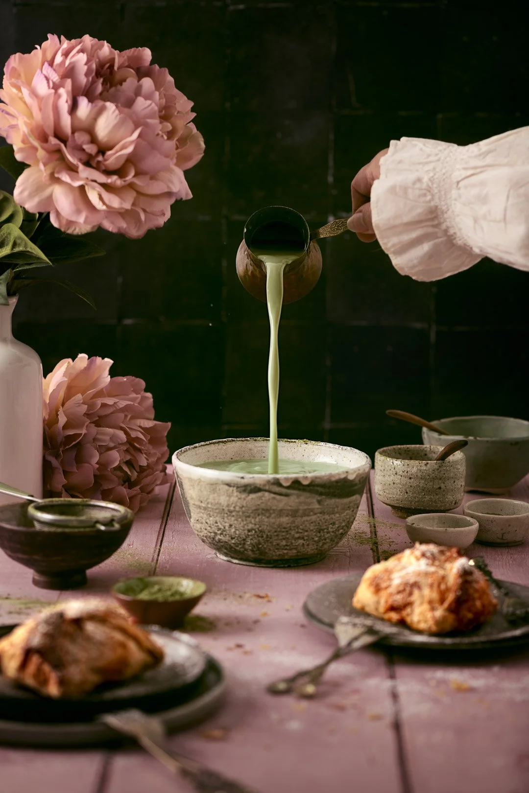 matcha, tea, flowers, pastry, hand, pouring, movement