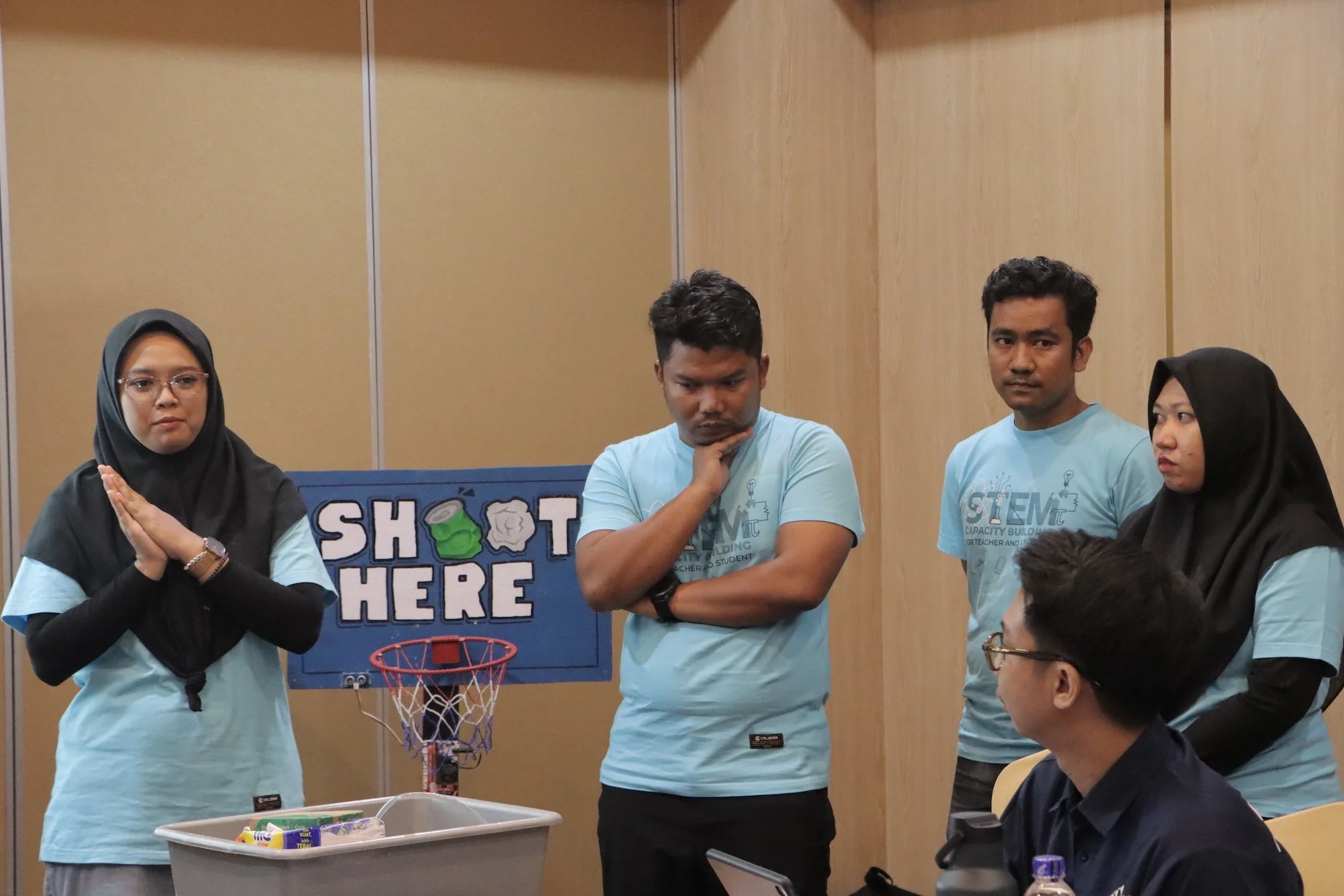  SMAN 20 Batam presenting their micro:bit system to monitor school cleanliness, encouraging a clean environment 