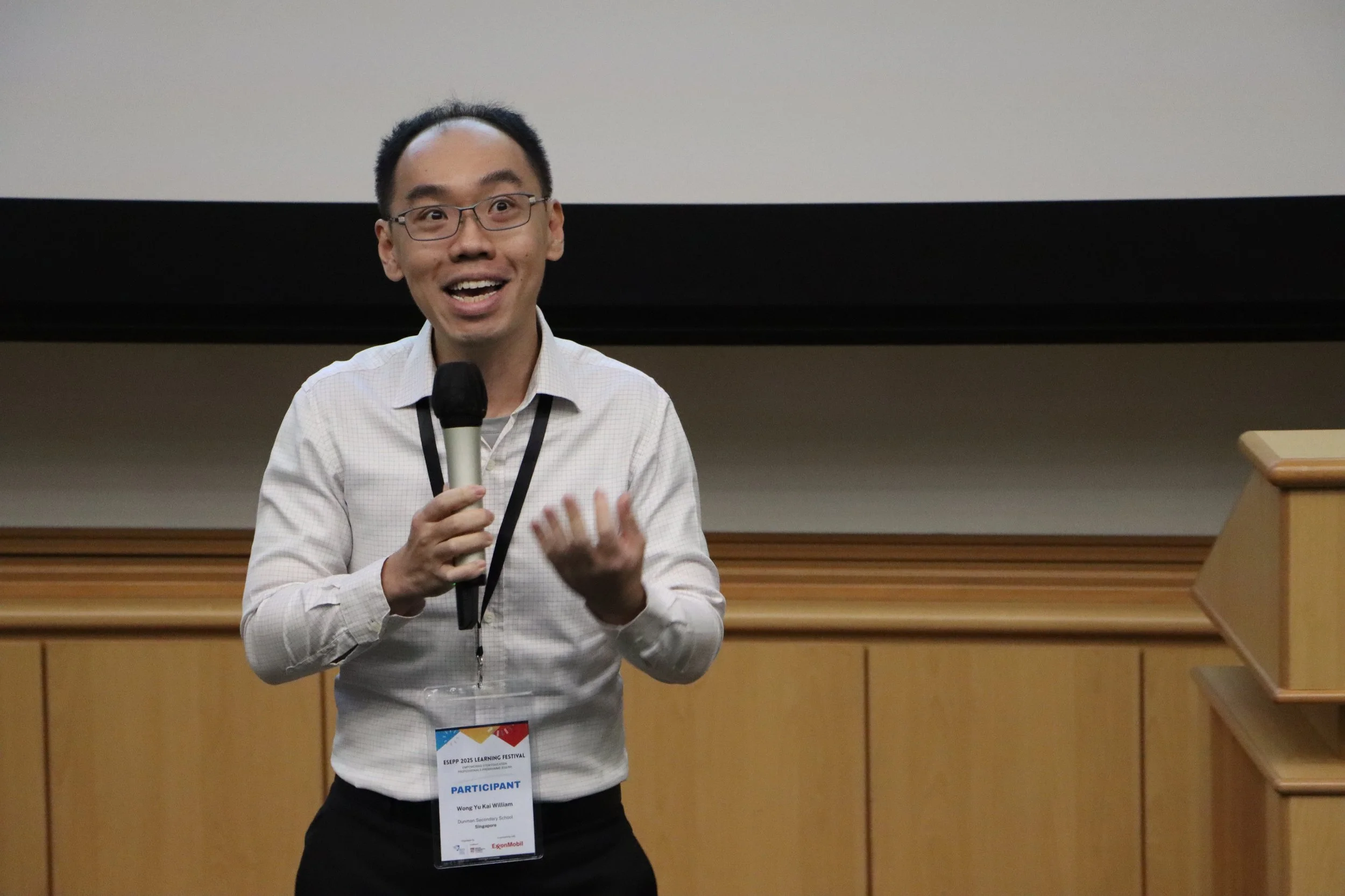 Wong Yu Kai William of the winning team from Dunman Secondary School presenting their winning lesson plan, “Hawker Heritage Harmony: Balancing Cultural Roots and Nutritional Science for Singapore's Future”.