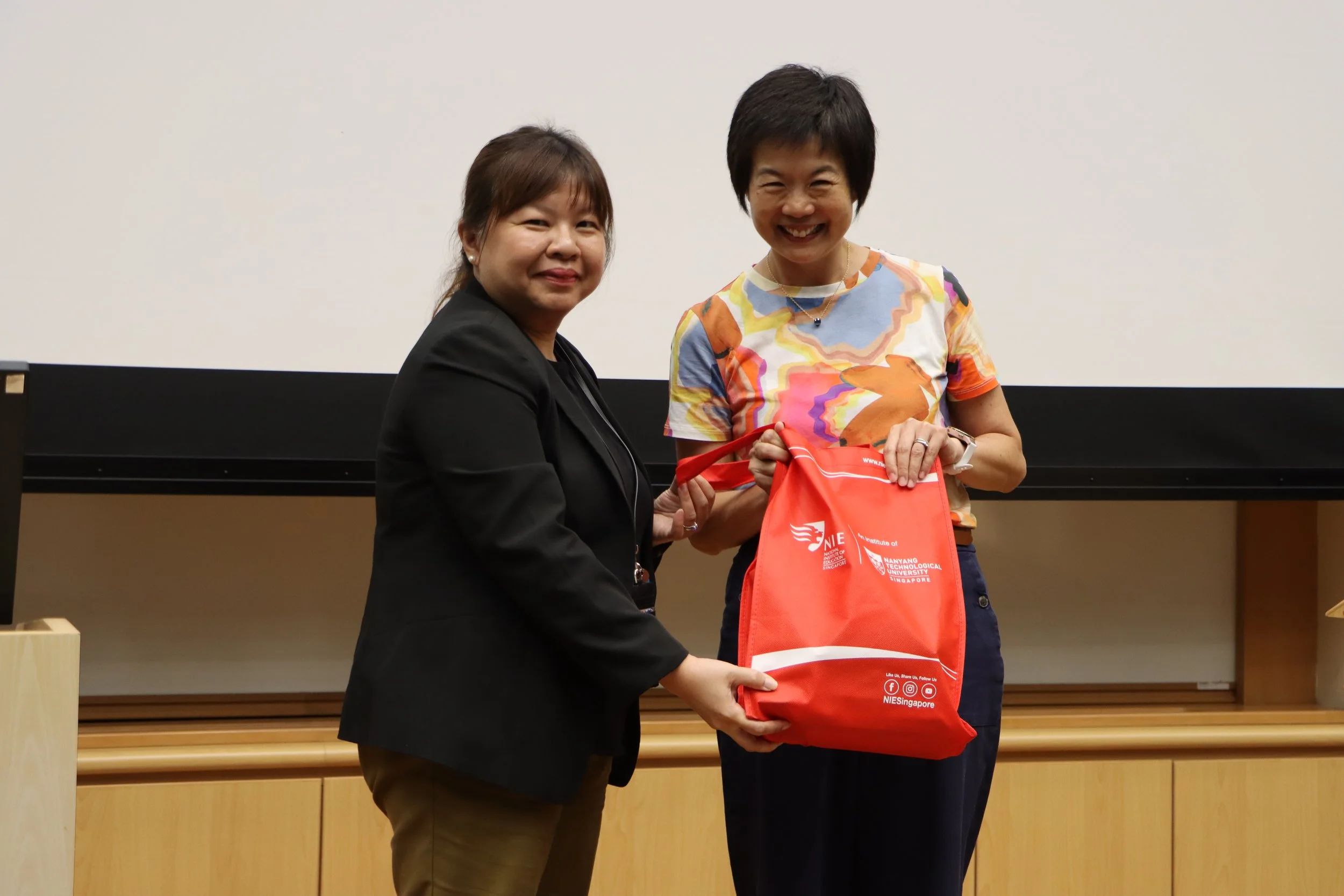 A/P Teo presented a token of appreciation to Ms Karen Wong.