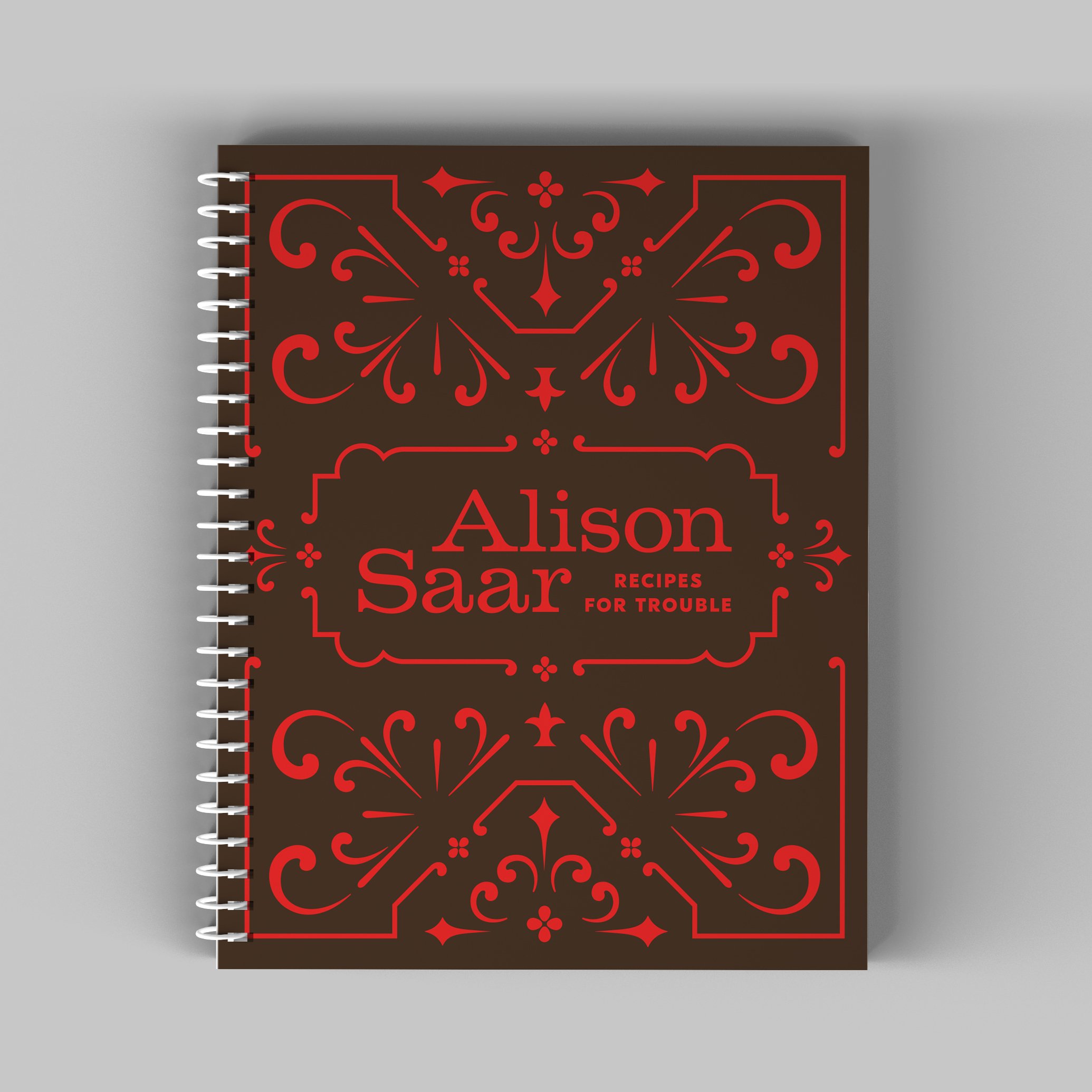A cookbook titled 'Alison Saar Recipes for Trouble' with a dark brown cover and red decorative patterns.