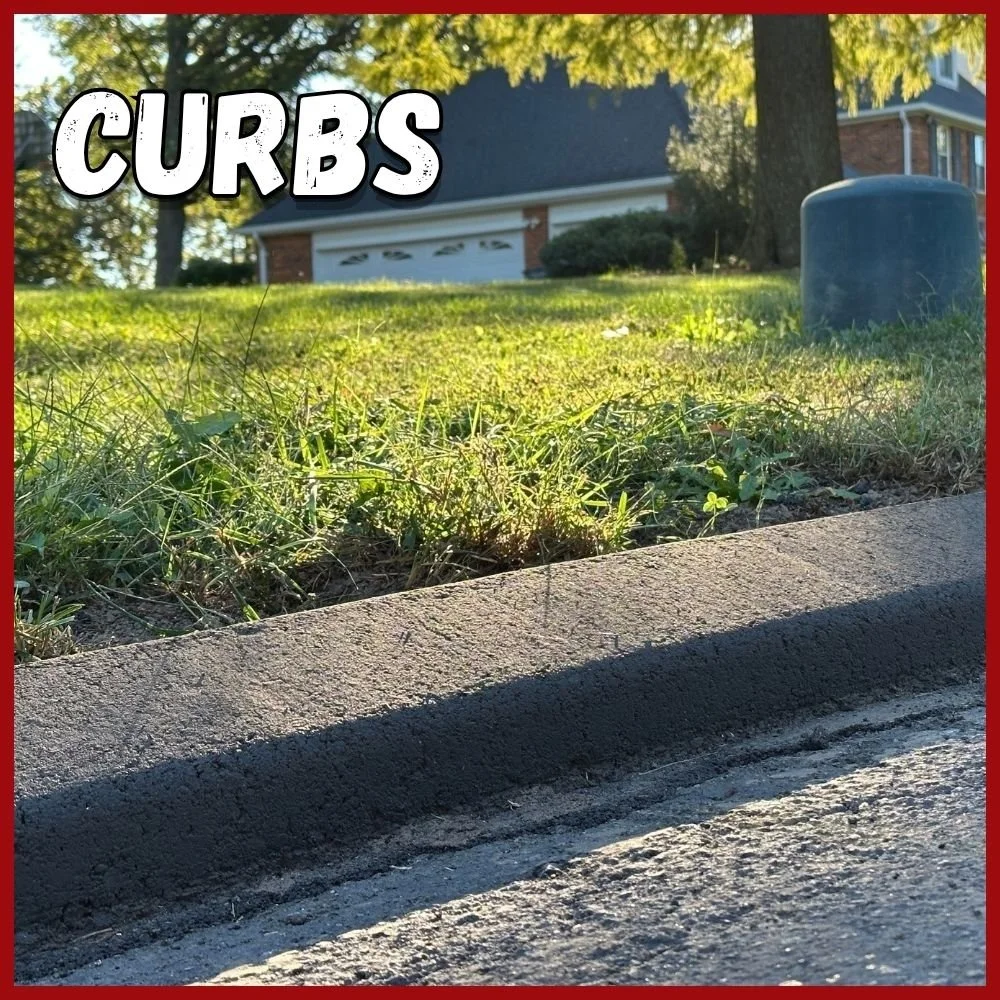 Curbs Text over a freshly installed curb with the morning light reflecting off of it
