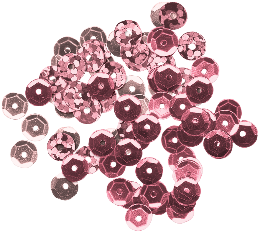 A collection of pink and silver sequins scattered on a surface. The Valentine's Museum NYC Valentine's Day Event.