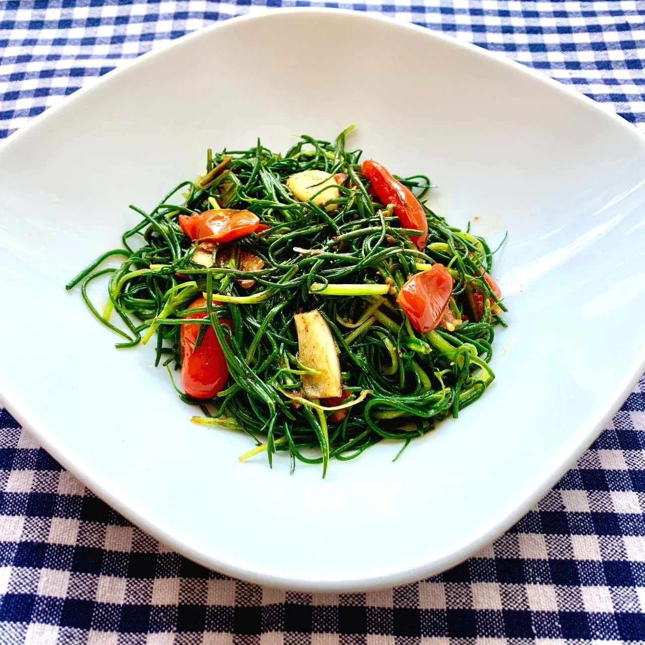 Sauteed Agretti with Garlic and Cherry Tomatoes