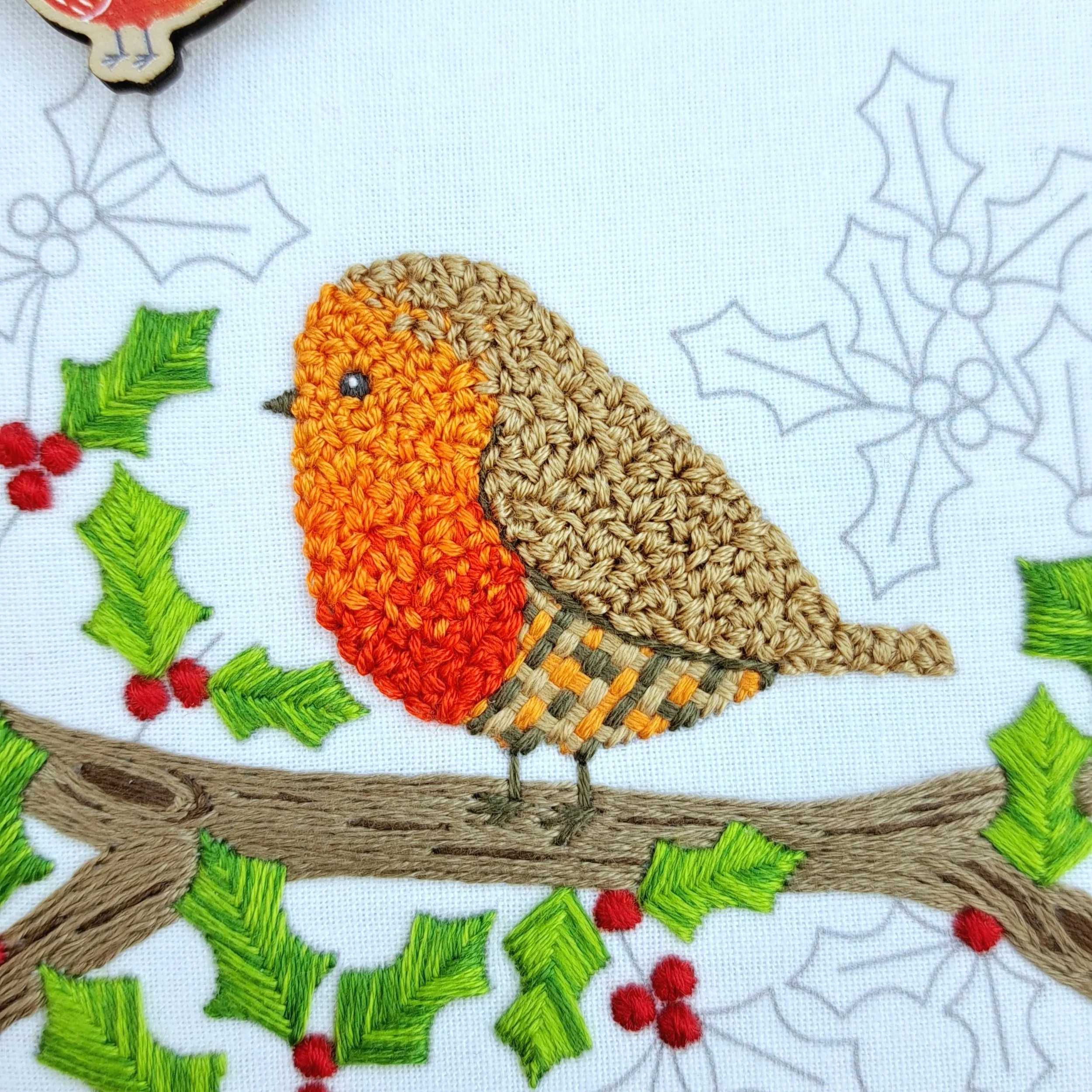 Close-up of the fully stitched robin using Loop Stitch.