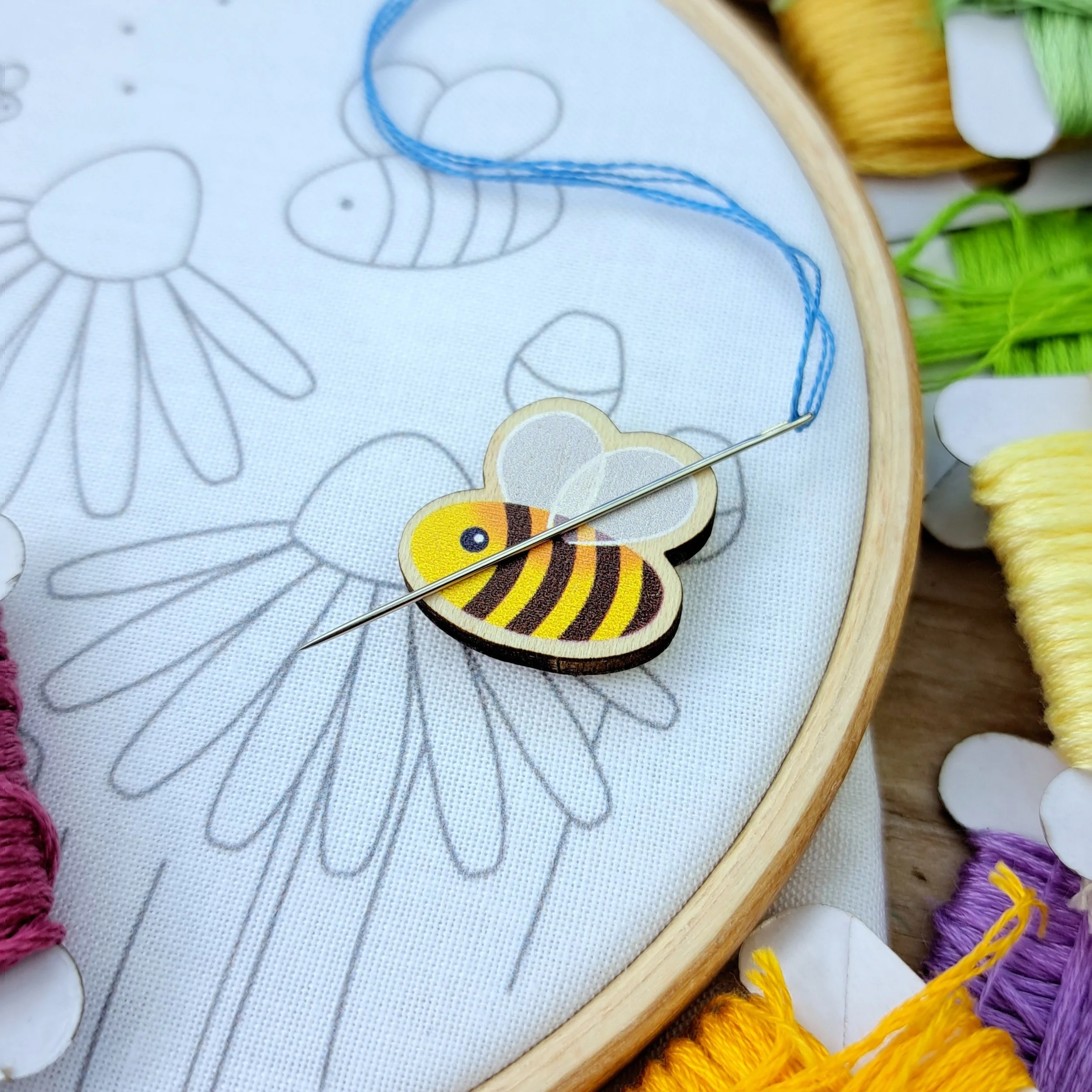 Colourful illustrated magnetic needle minders by Bluebell Love
