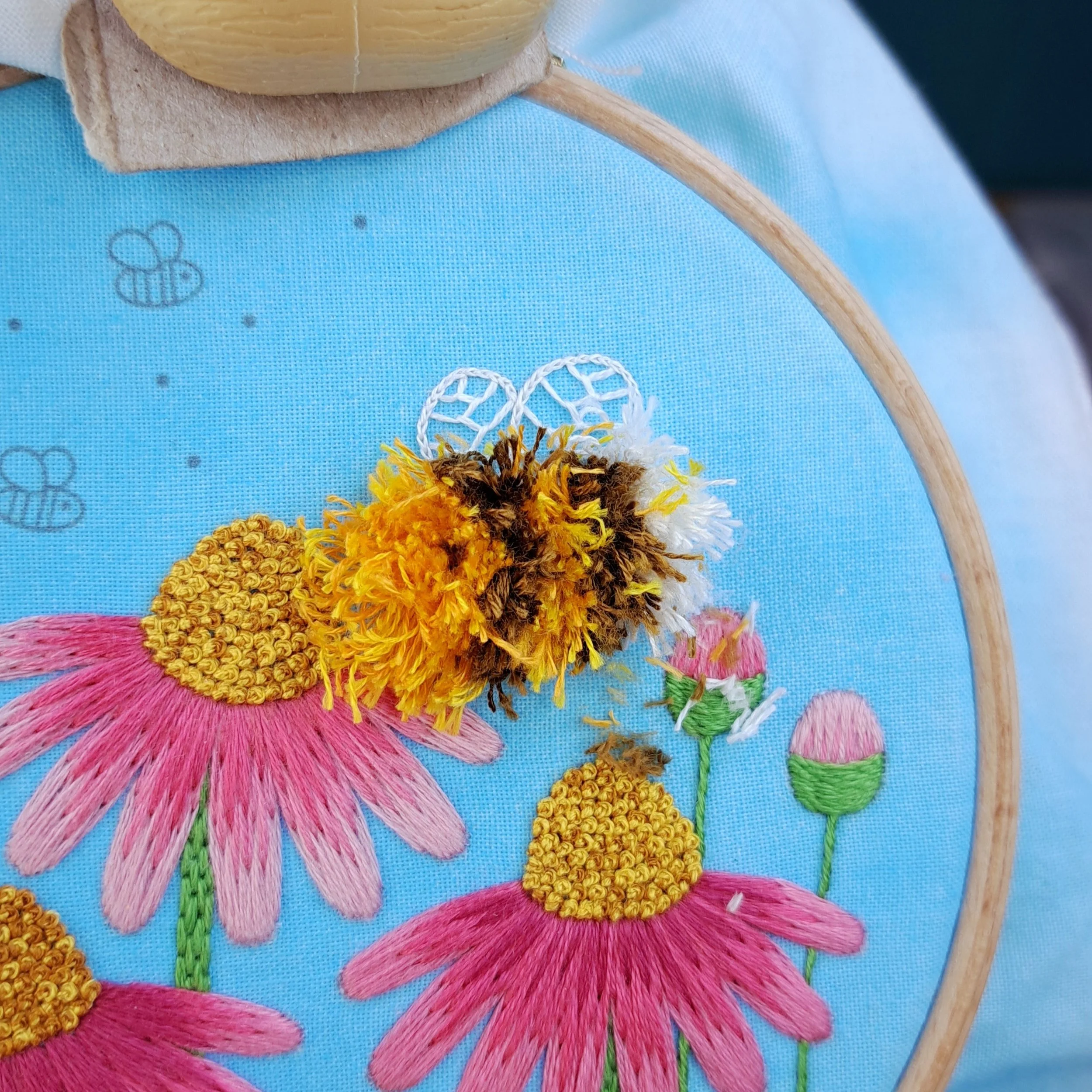 Close-up of the Turkey Stitch loops having been snipped with embroidery scissors.