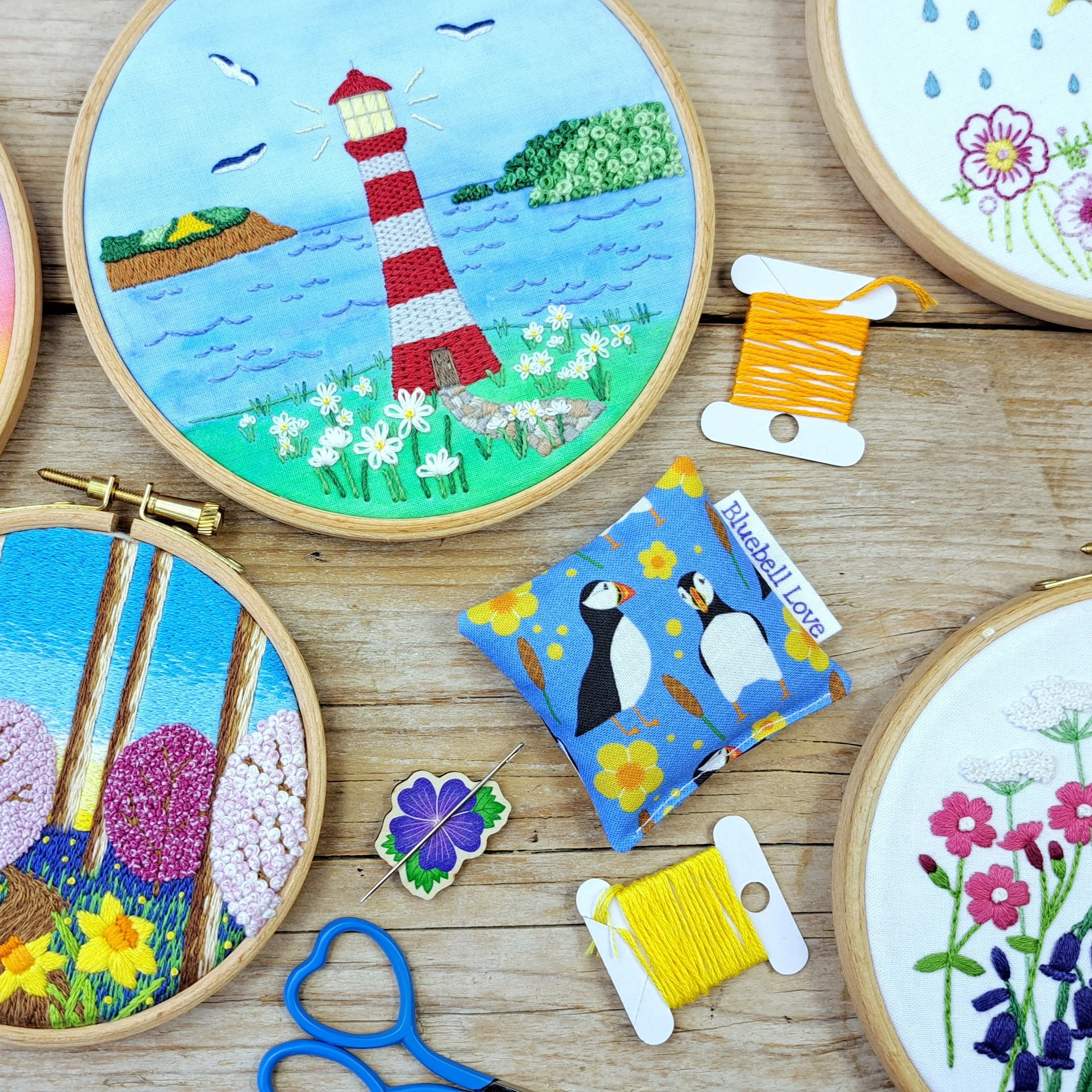 A collection of colourful embroidery kits and handmade accessories by Bluebell Love