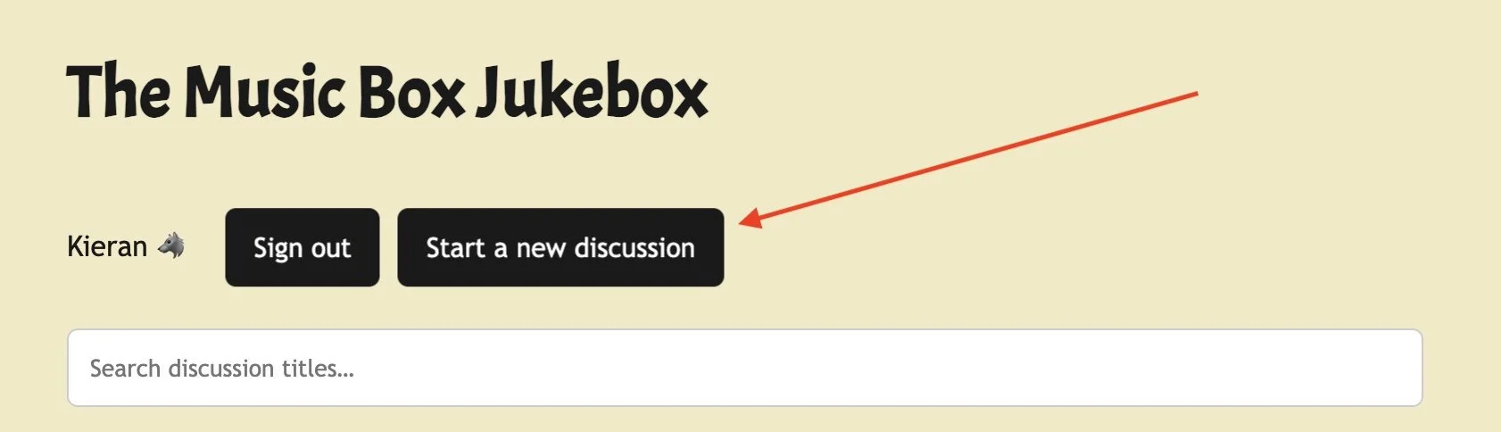 Screenshot of a webpage titled 'The Music Box Jukebox' with a user named Kieran. There are two black buttons labeled 'Sign out' and 'Start a new discussion,' and a white search bar below them.