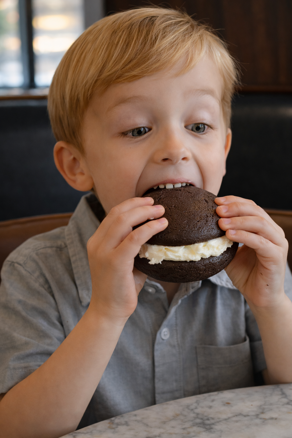 boy eating whoopie pie.png