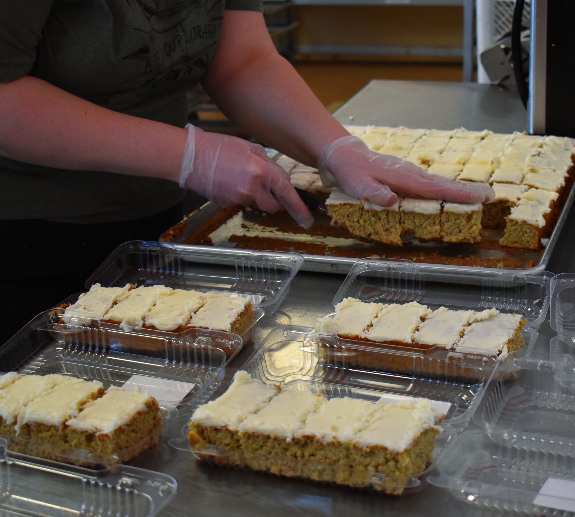 hands with cake bars.png
