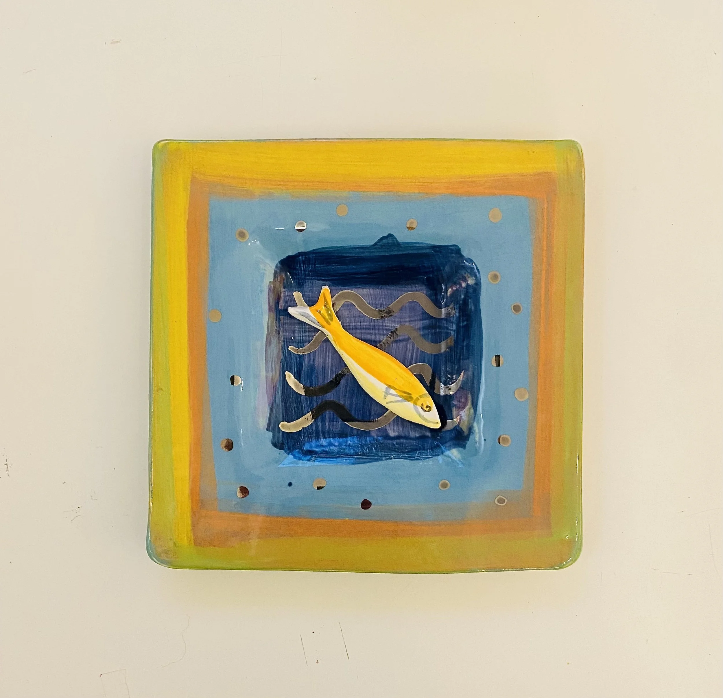 Hand made ceramic slipware plate 23cm x 23cm. May be wall hung. 