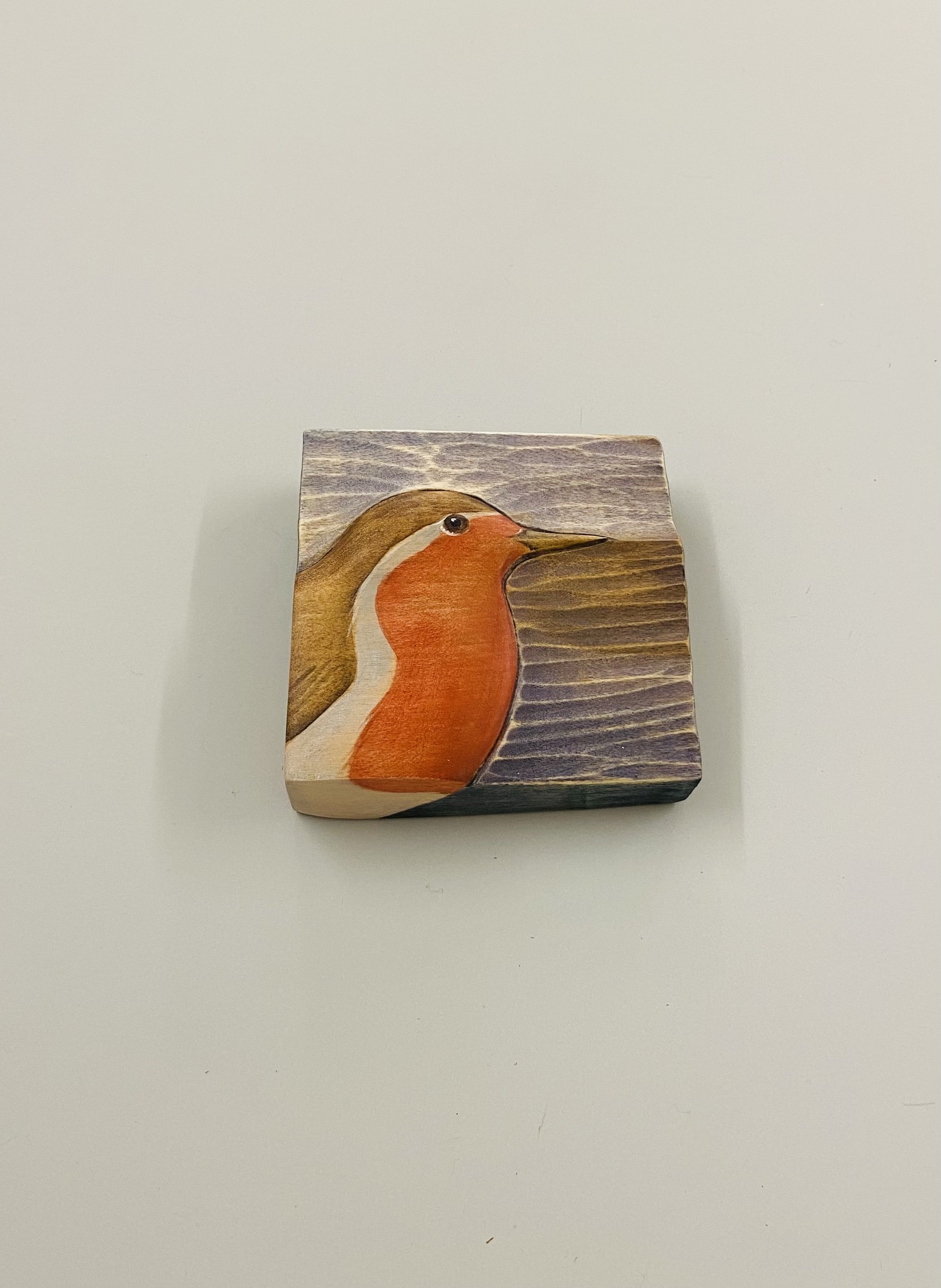 New Robin collection for autumn. 'Robin VI' hand carved & painted English limewood 8cm x 8.5cm x 2cm SOLD Each carving is titled and carries the artist's mark, ready to hang.