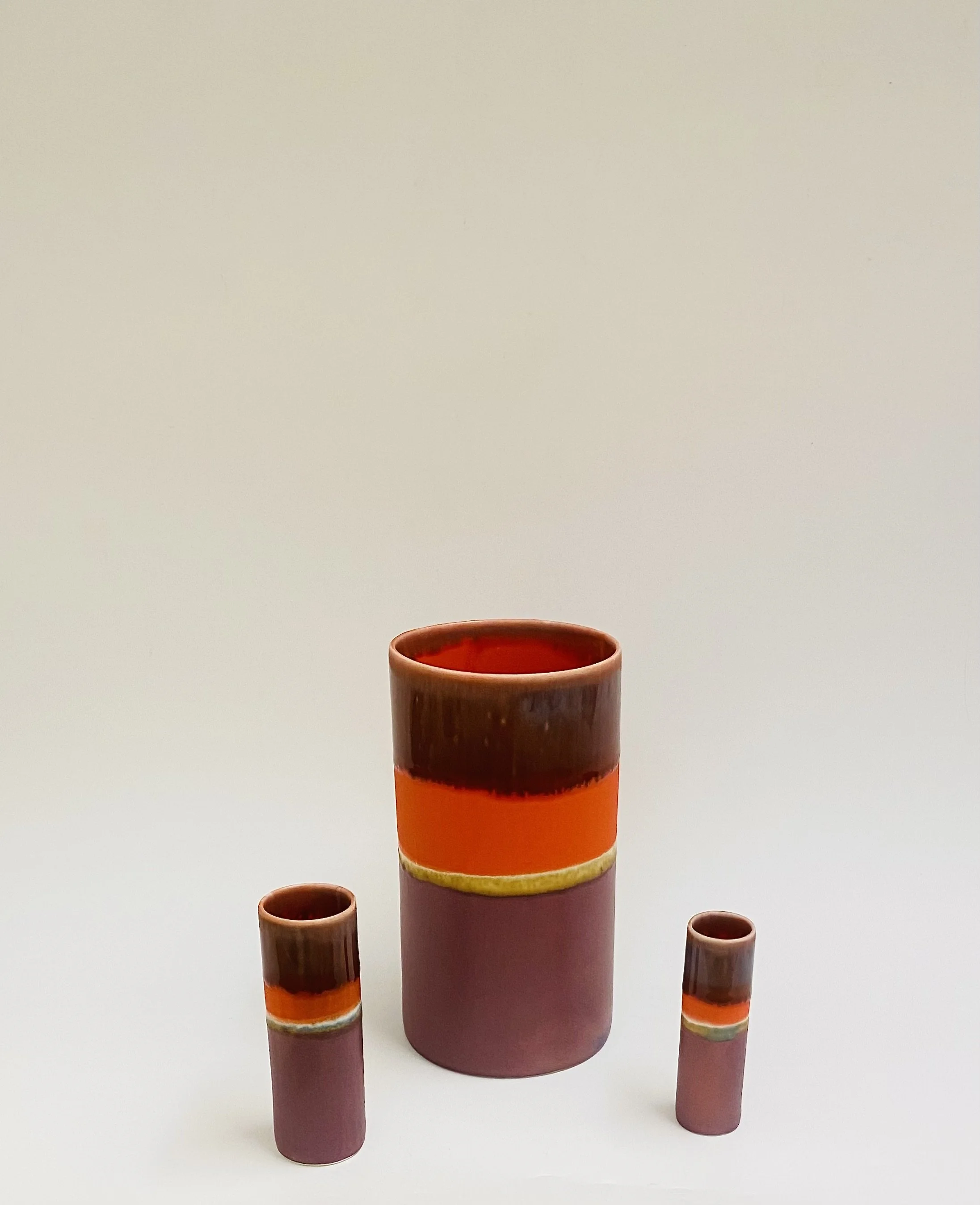 Rich colours for Autumn, hand made slip cast porcelain ceramics by SGW Lab. Extra large vase H20cm D11cm £54, medium vase H13cm D4cm £27, small vase H10cm D2.5cm £22