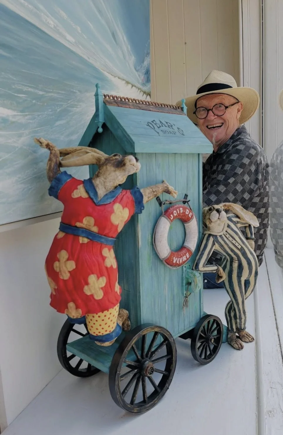'Jois de Vivre', a most amazing new sculpture by artist JJ Vincent, pictured here. Created entirely by hand in ceramic and mixed media especially for Serena Hall Gallery, it is a joyful celebration of The English Seaside and it's original beach hut T