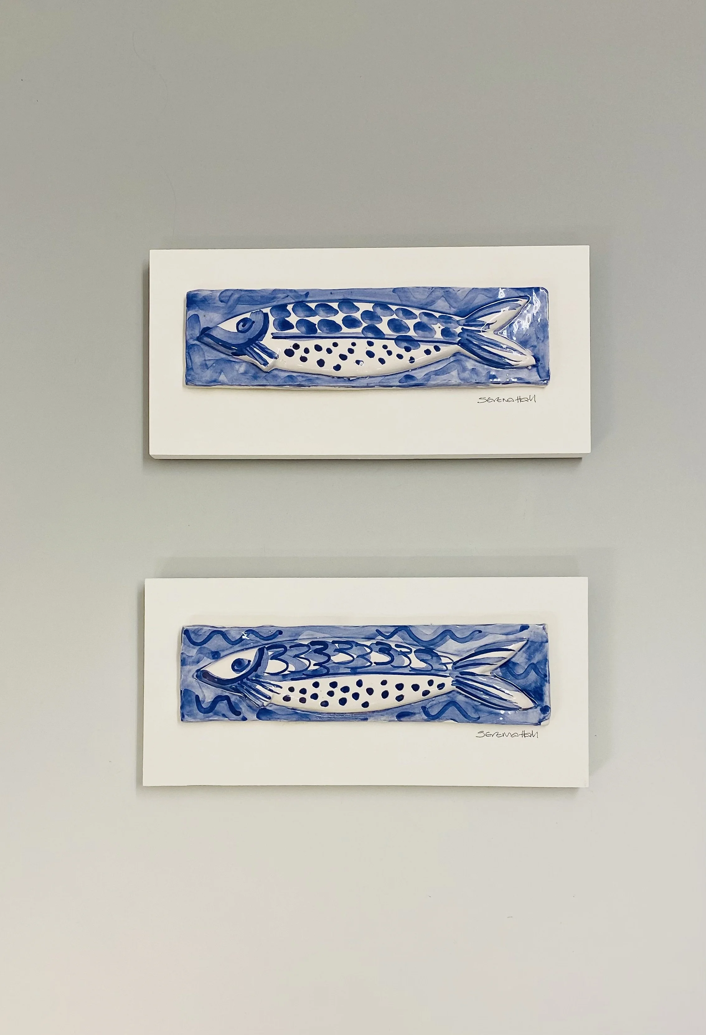 'Happy Fish' by Serena Hall. Handmade tin oxide glazed earthenware wall plaque 34cm x 16cm x 4cm. Ready to hang £75.00 each
