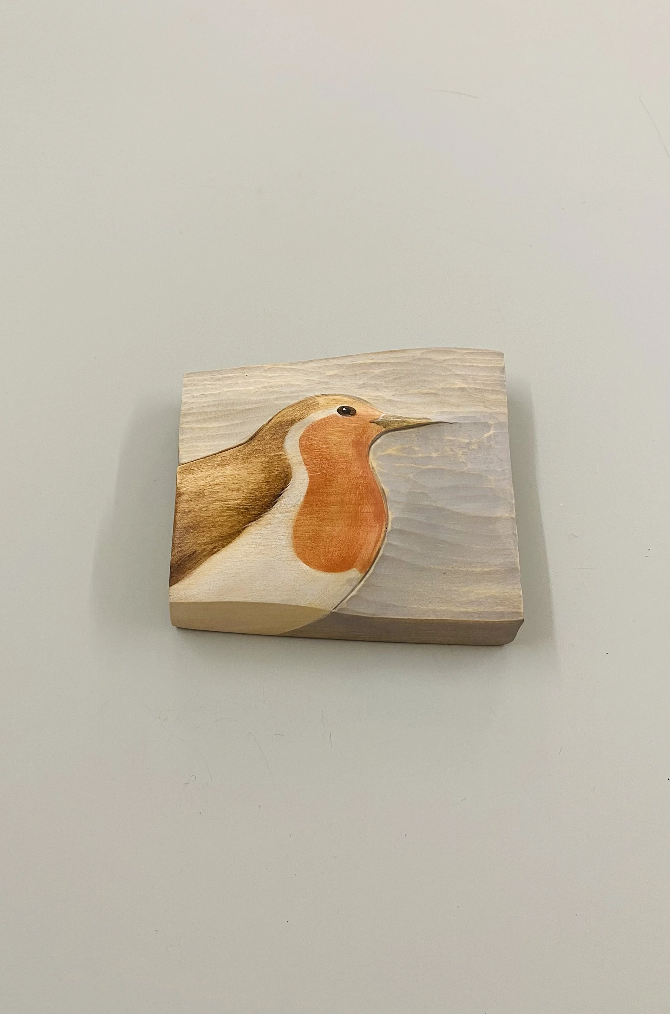 New Robin collection for autumn. 'Robin I' hand carved & painted English limewood 11cm x 10cm x 2cm £77.00 Each carving is titled and carries the artist's mark, ready to hang. 