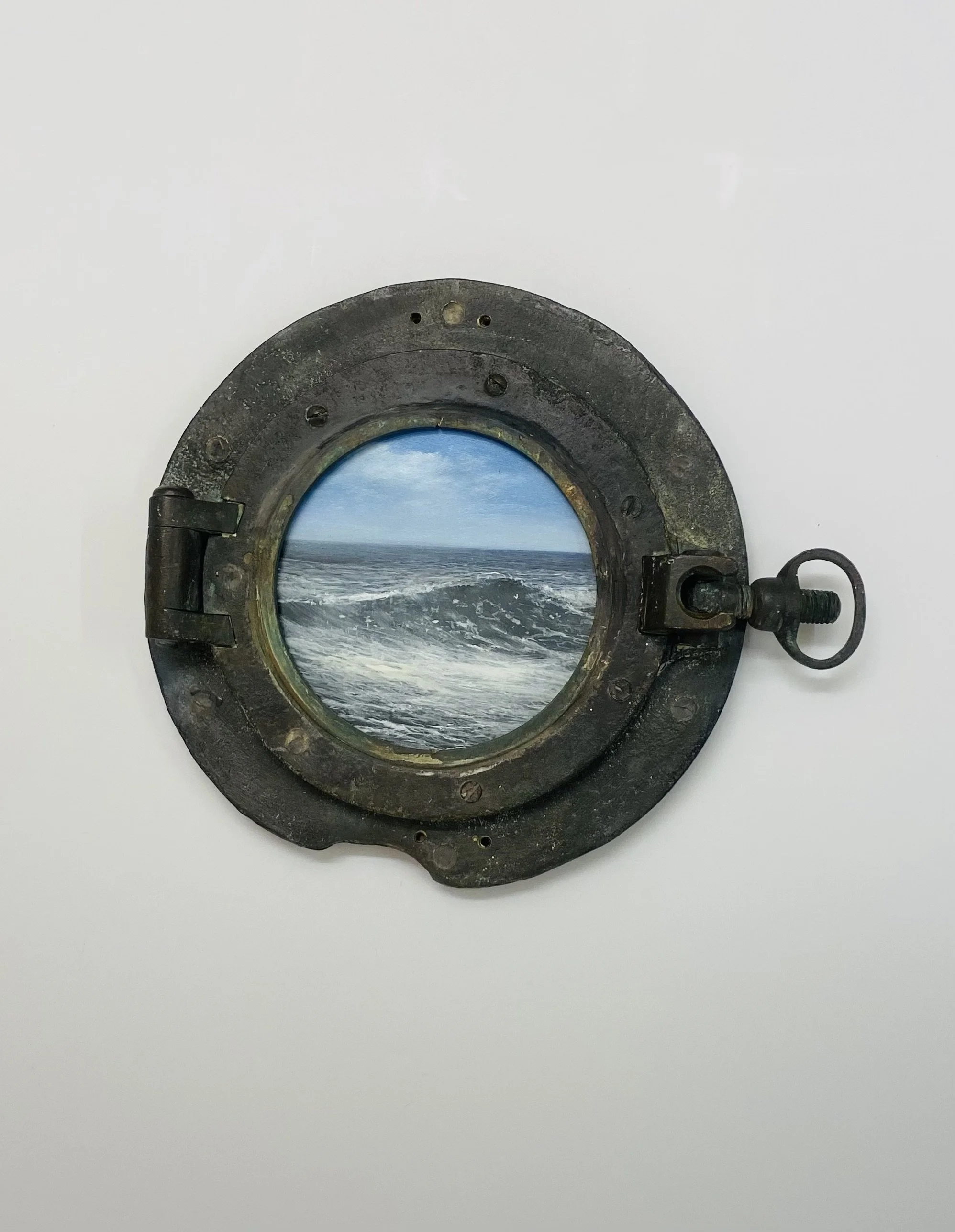 Porthole painting by Norfolk artist Garry Pereira. 'Rising Slowly' oil on panel in an original ship's porthole. Opens out to display a further 2 paintings (see second image). Complete with fixings to easily wall hang. Dimensions: closed 40cm x 33cm x