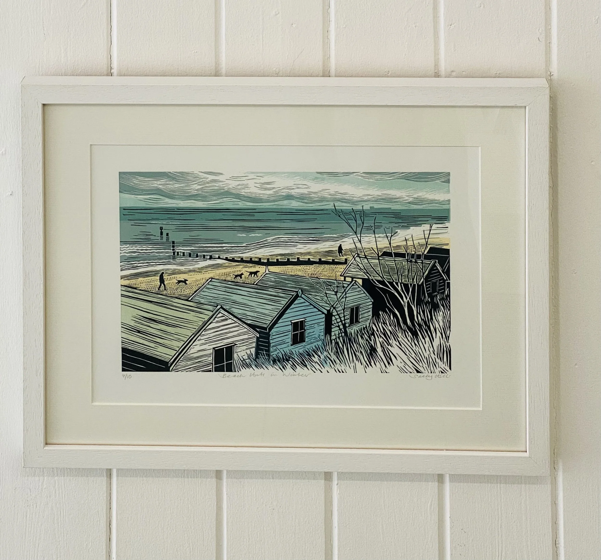 'Beach Huts in Winter' shown in frame