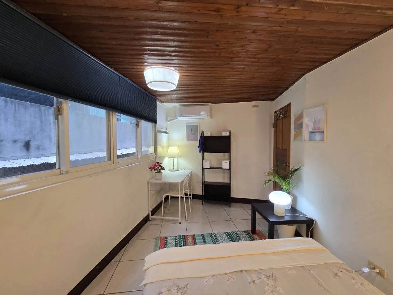 Modern Dongmen Taipei rental apartment living room with loft stairs - furnished Taiwan accommodation