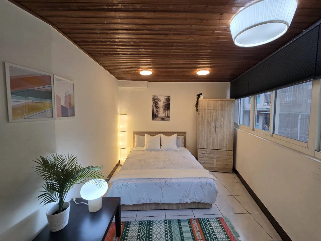 Modern Dongmen Taipei rental apartment living room with loft stairs - furnished Taiwan accommodation