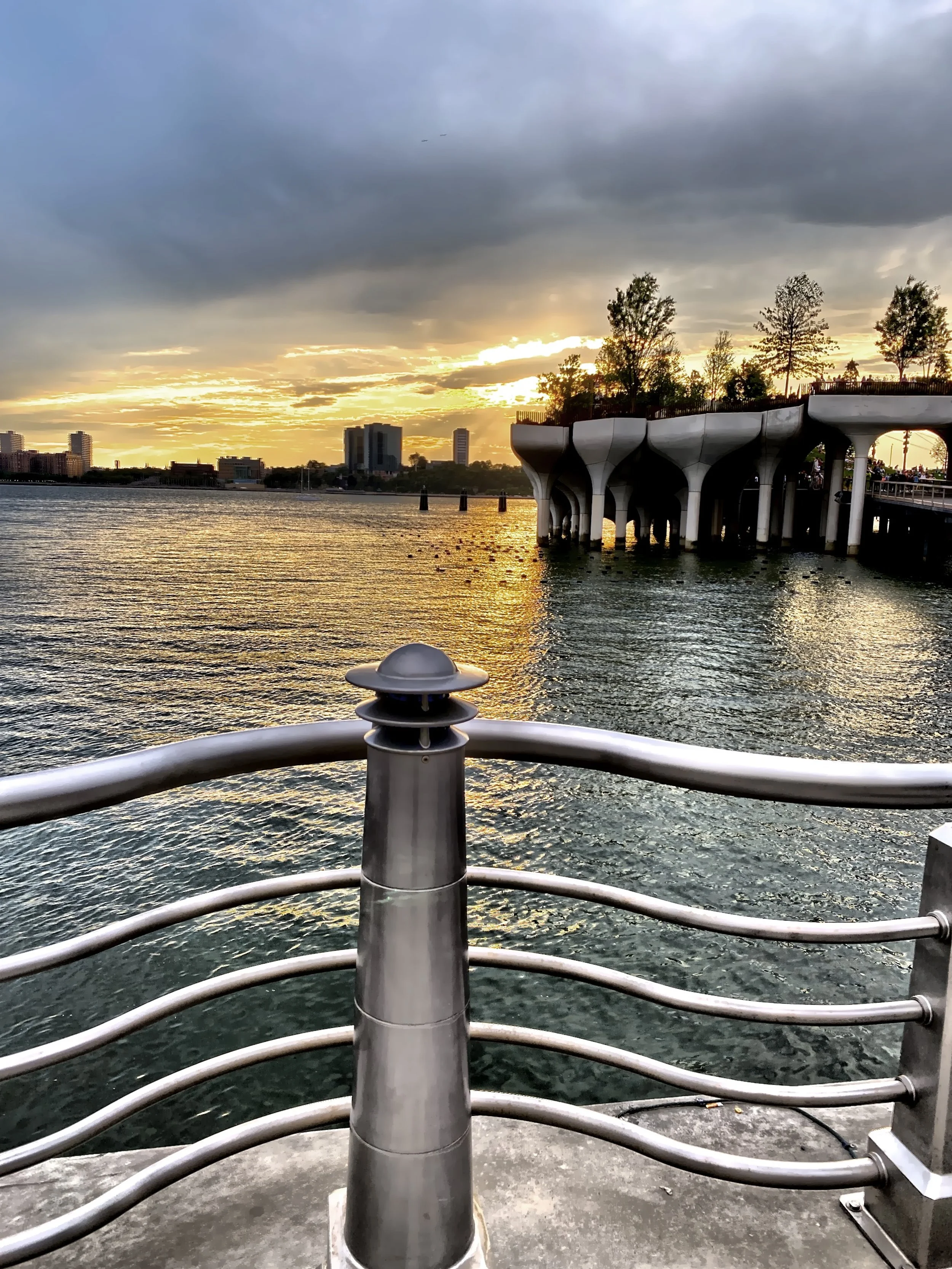  Looking out at Little Island as the sun sets behind it 