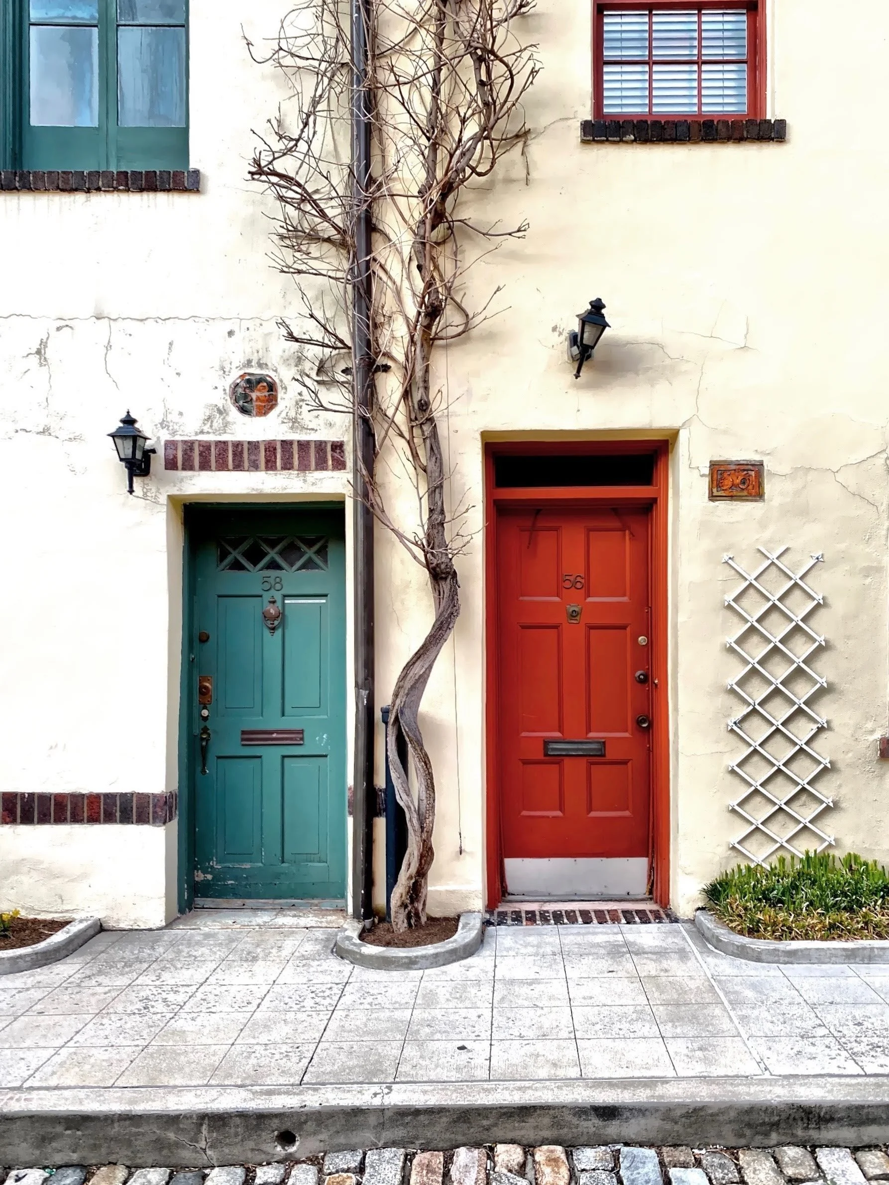  The buildings, on the north side of Washington Mews, were built as homes by Sailors Snug Harbor for elderly and destitute sailors. 