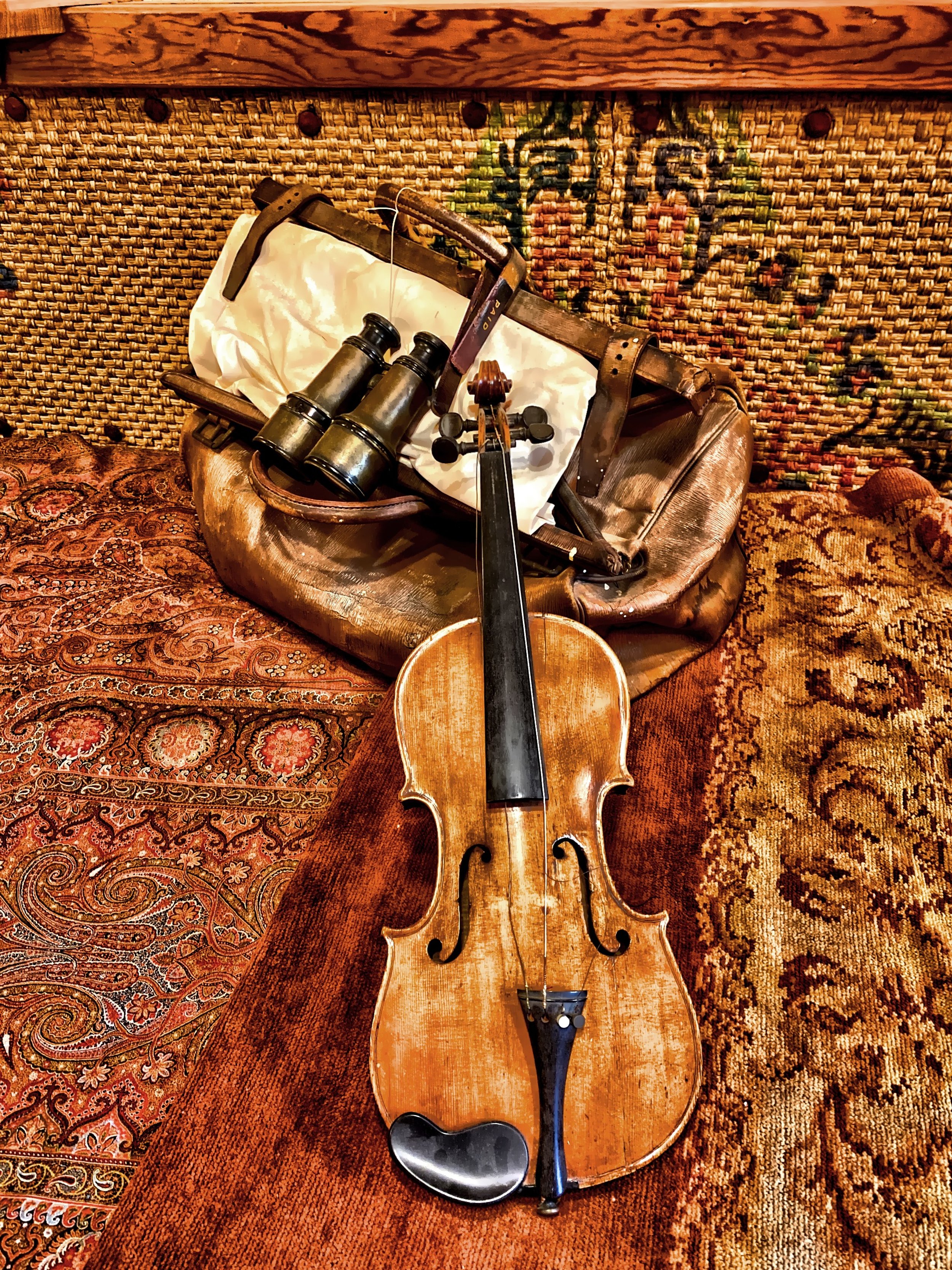  Gillette’s bed with his violin, binoculars and leather bag 