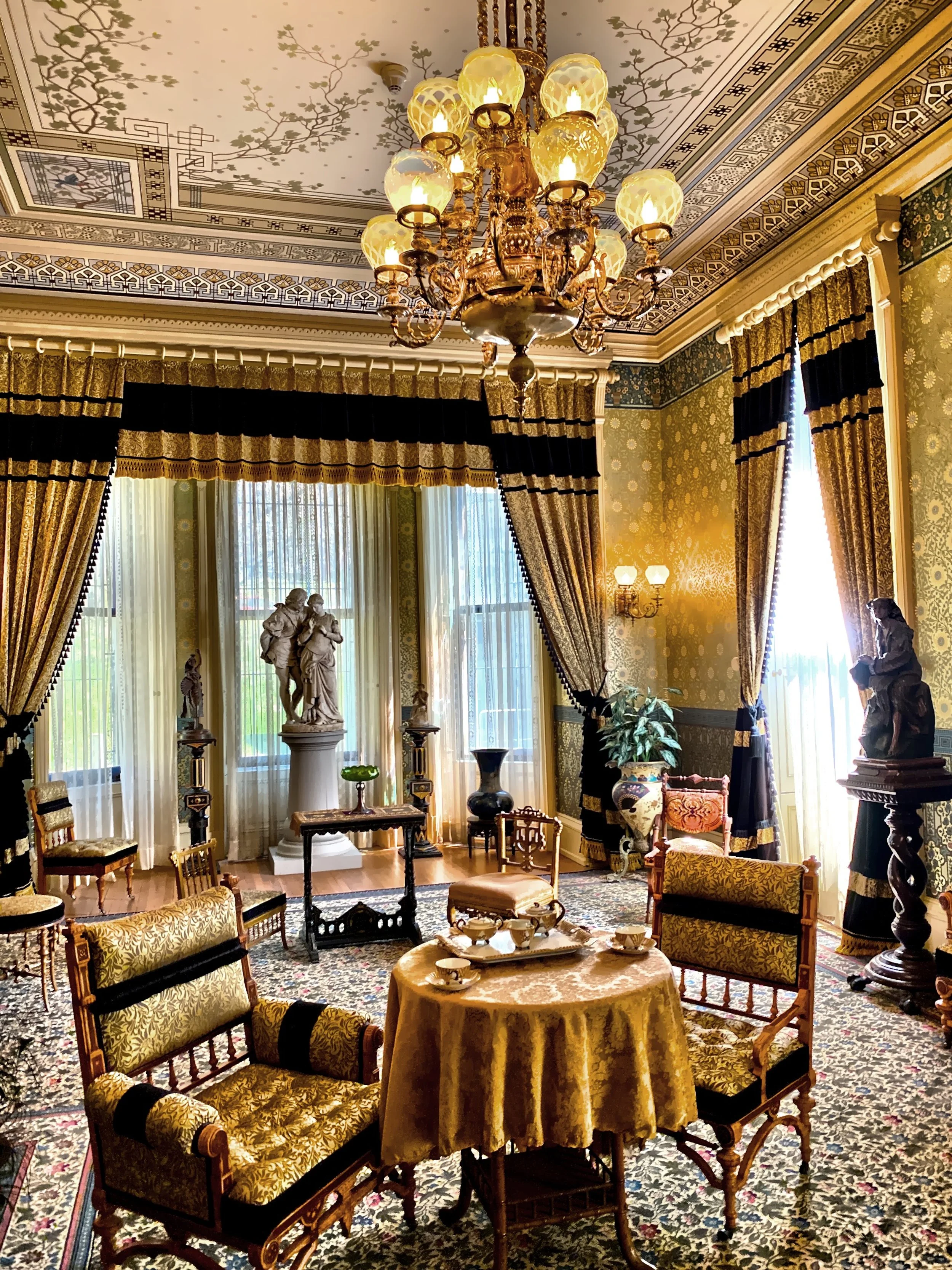  Pictured here is the brightly lit Parlor off the Great Hall on the east side of the house.  Extensive research determined that the designer of the original wall coverings in this room was Bruce Talbert. 