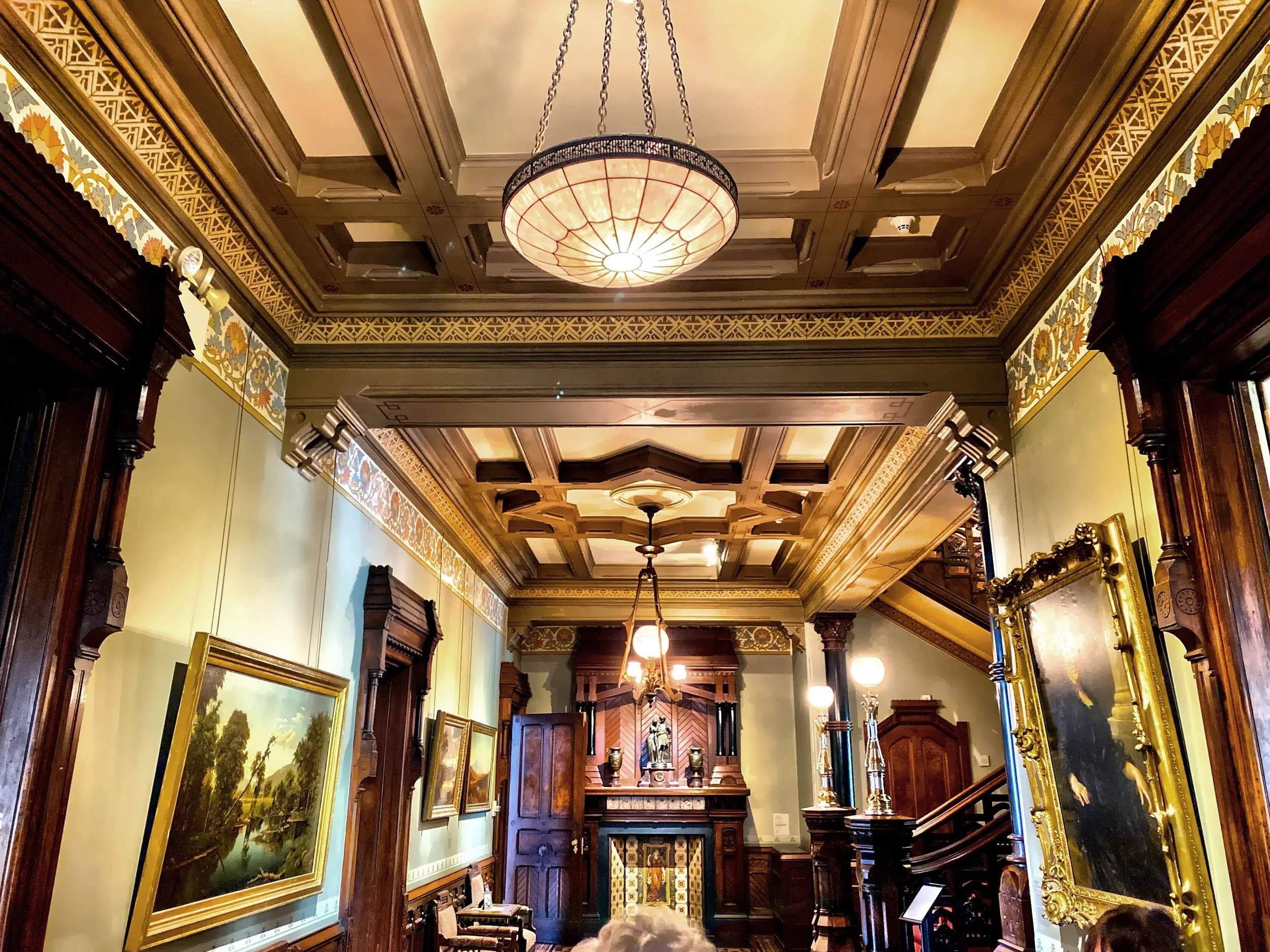  The Great Hall with stenciled painting, artwork and original restored woodwork 