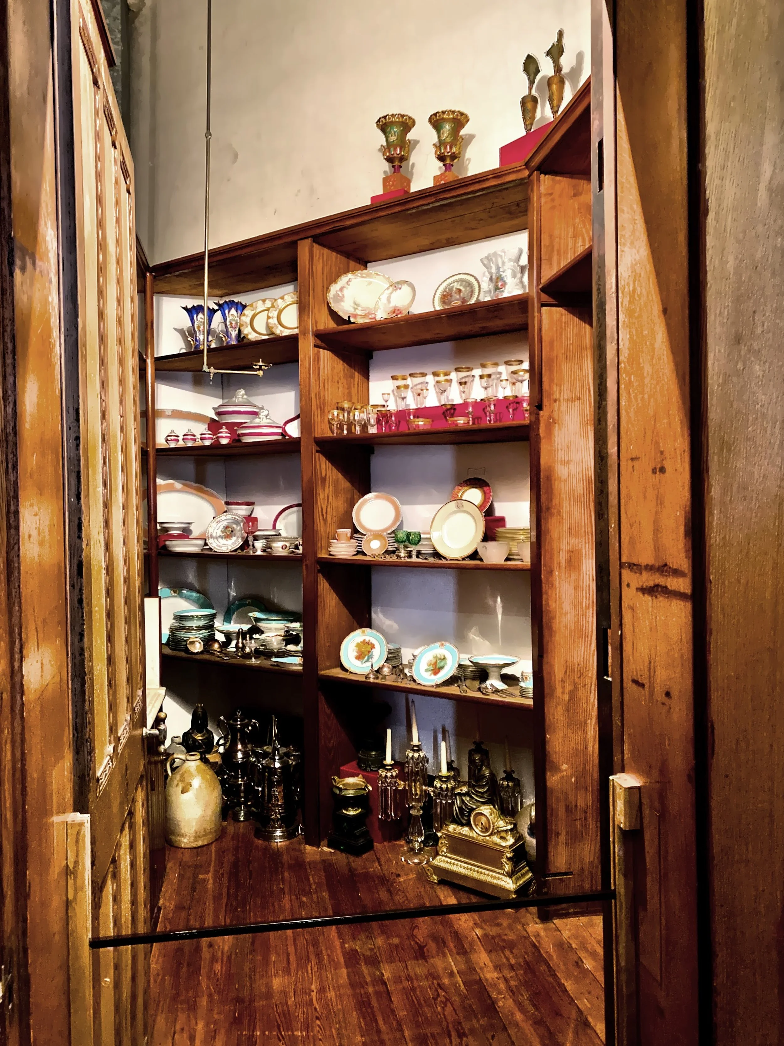  A door in the Dining Room leads to this silver vault with shelves and a sink.  It has a double-door, one of wood and the other of iron to protect from fire and burglary. . 