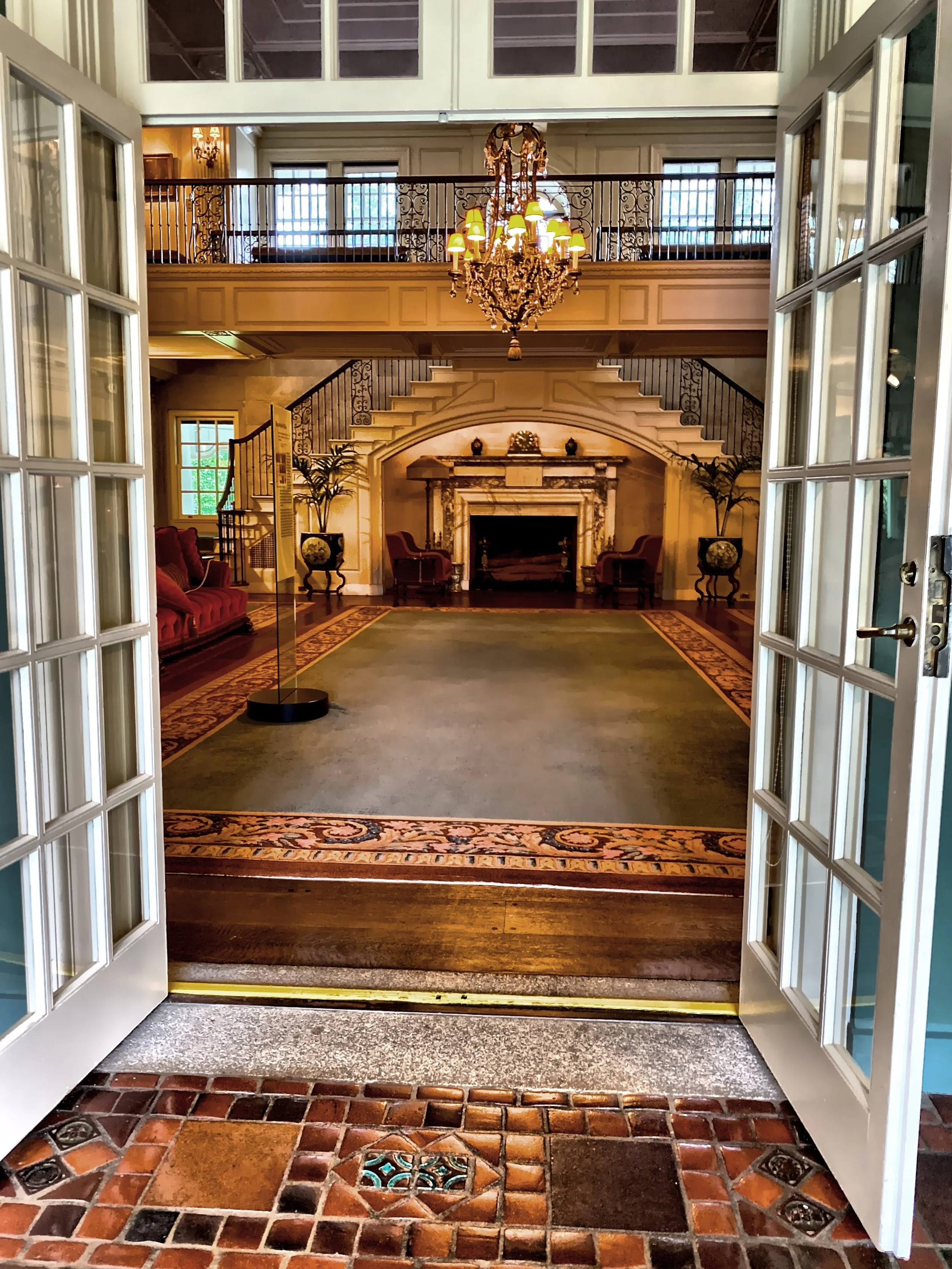  The view of the reception hall from the sun porch.  You will see some metal works created by artist Samuel Yellin. 