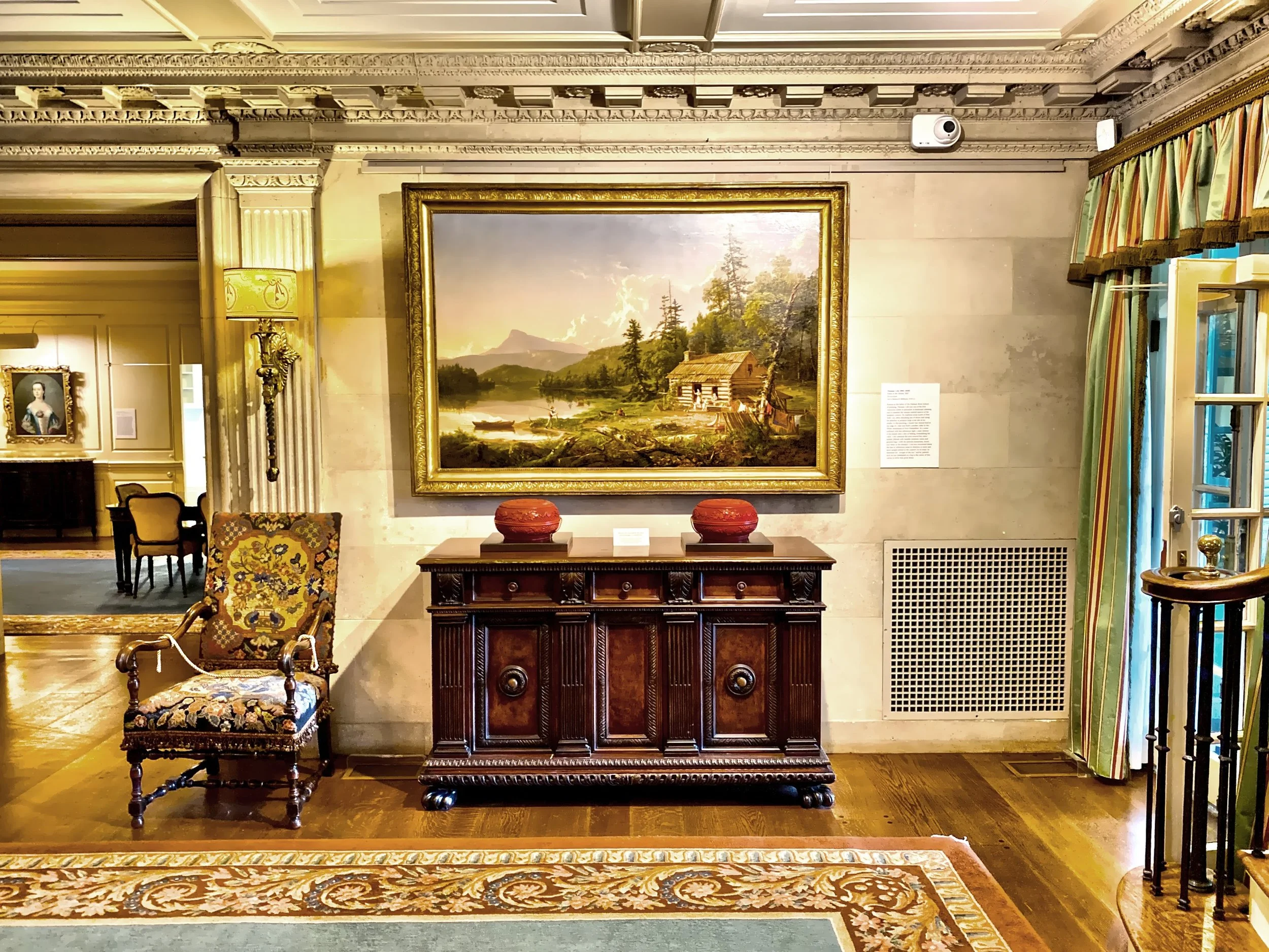  Works of The Hudson River School members Frederick Church and Thomas Cole in the reception hall. 