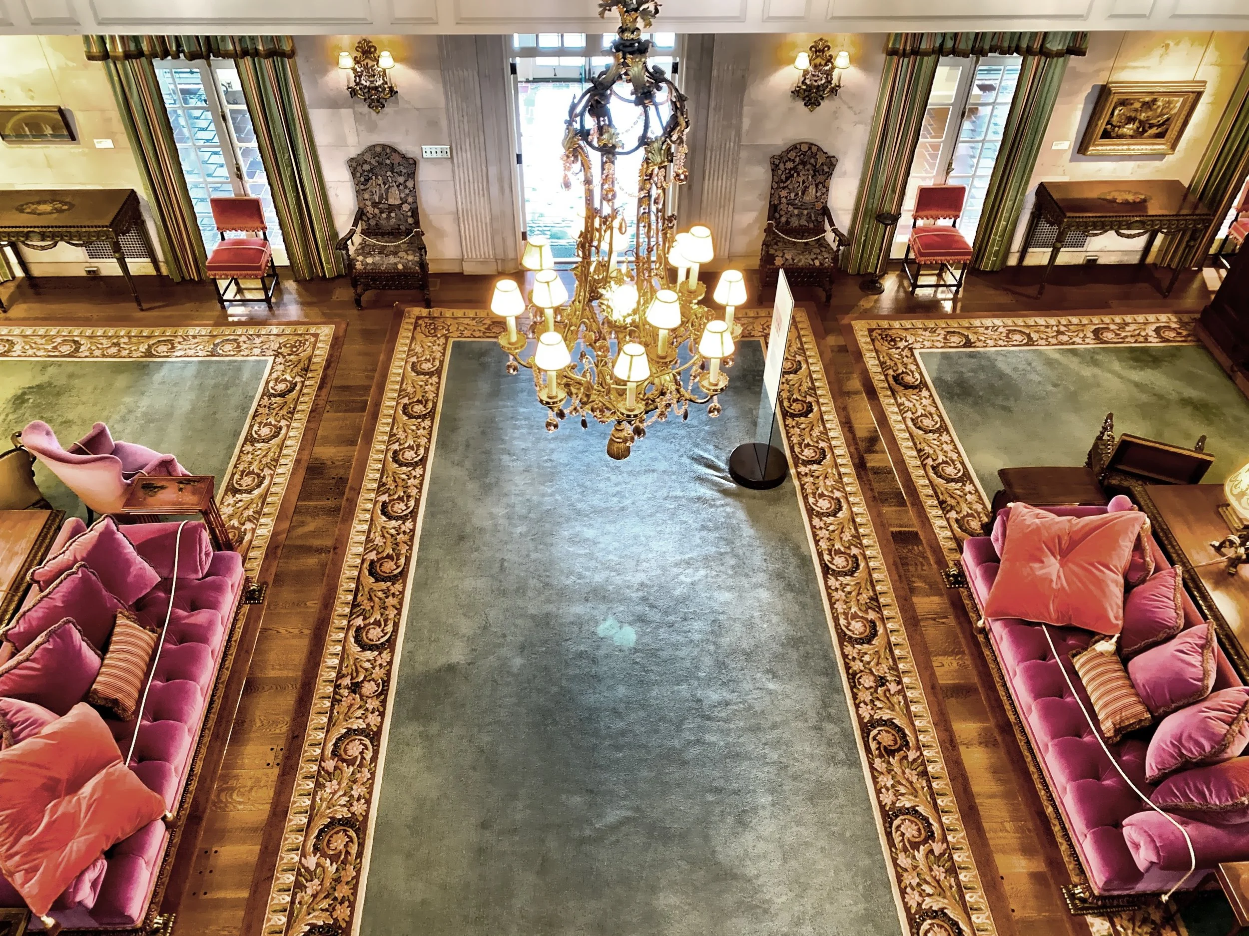  Looking down into the reception hall from the second floor balcony 
