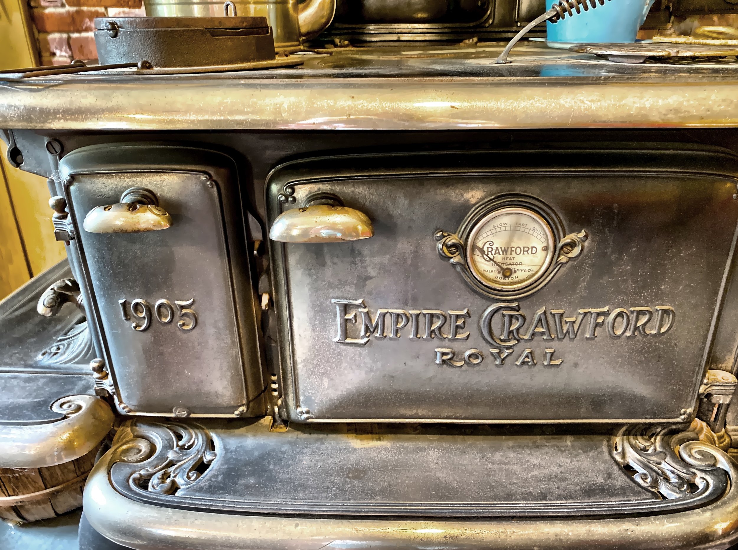  You will “slow, fast, quick” as heat indicators on the dial in the front of the Empire Crawford Royal 1905 stove 