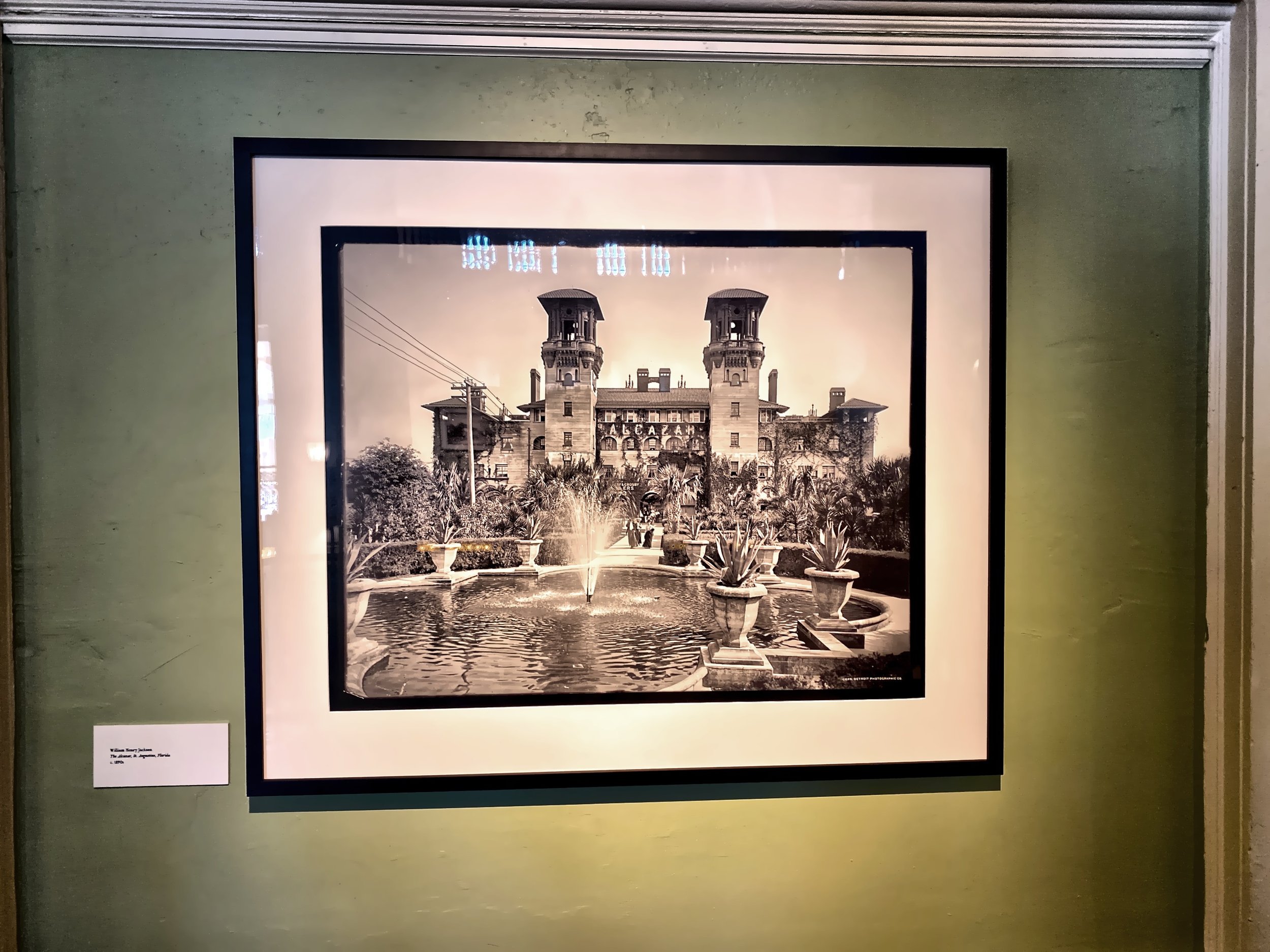  An old framed photograph of the Alcazar Hotel 