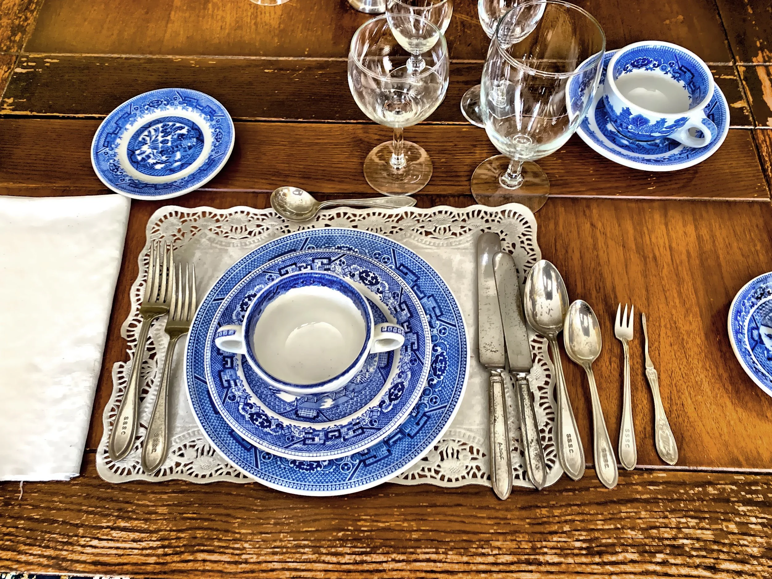  Original South Side Sportman’s Club silverware with the Connetquot River Club dinner service.  