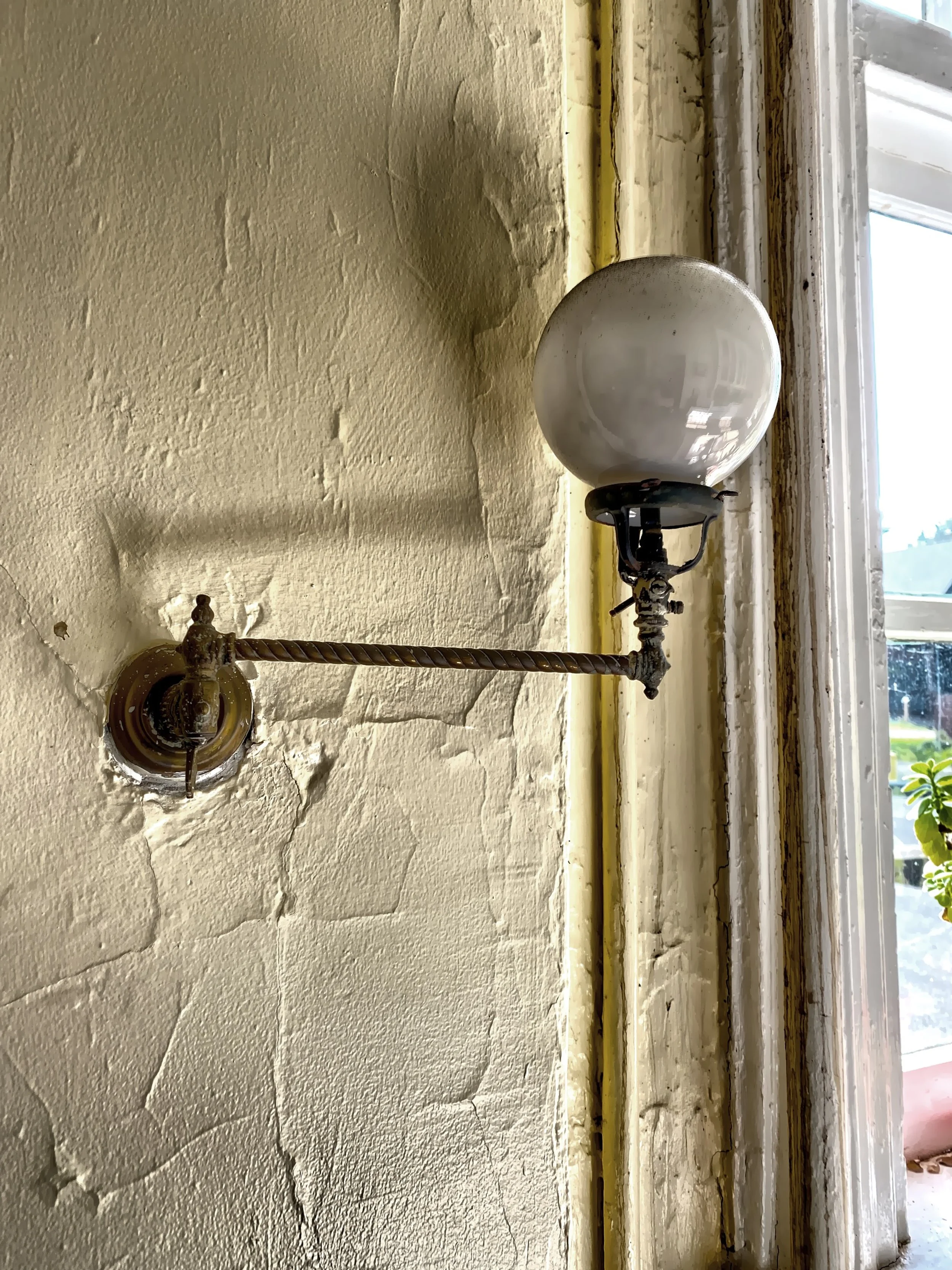  I was told this is the last intact original gas light glass shade that the club used for lighting.  Halls and rooms were originally lit with oil lamps and then replaced with gas lips like this one. 