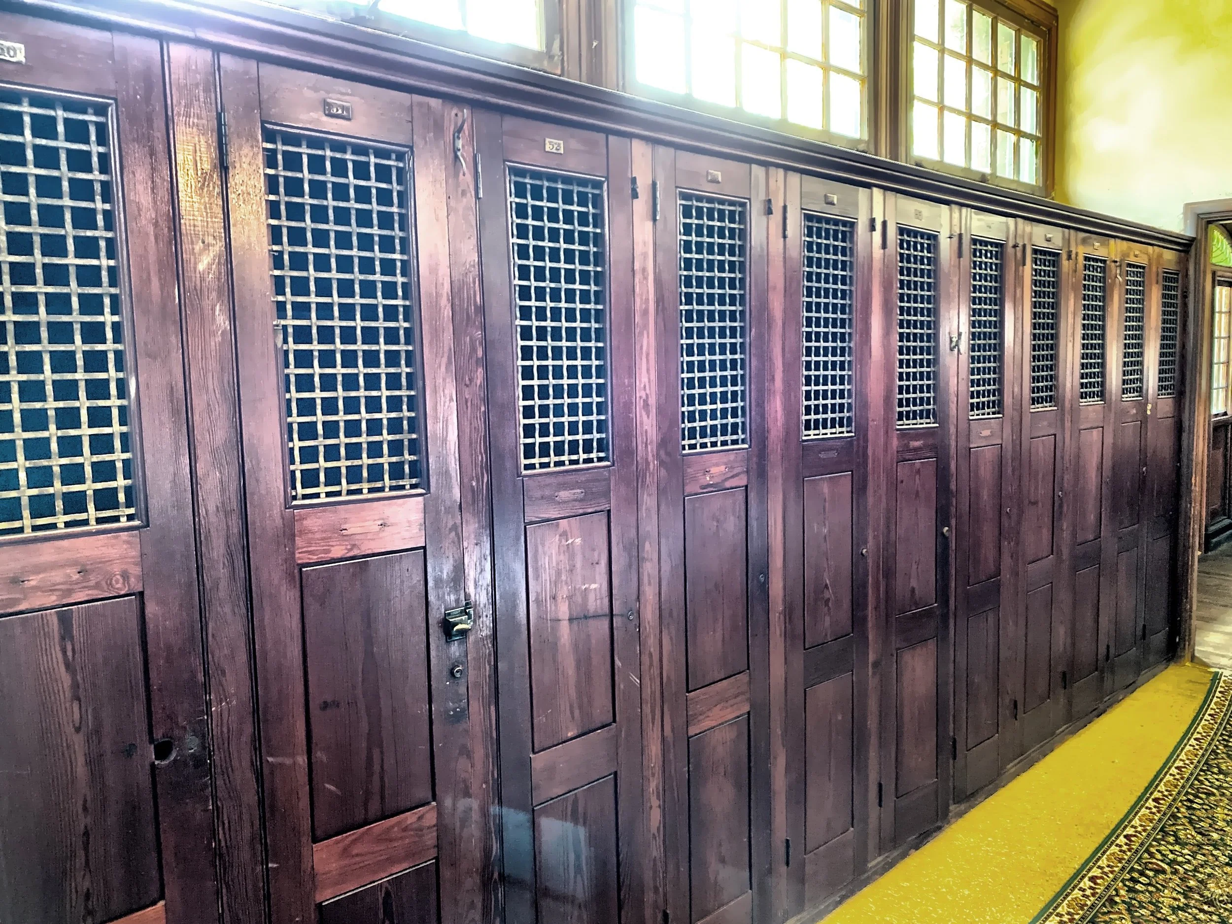  This is the locker room with rows of lockers that remain untouched and are in great condition.  The members would store their fishing and hunting gear in here. 