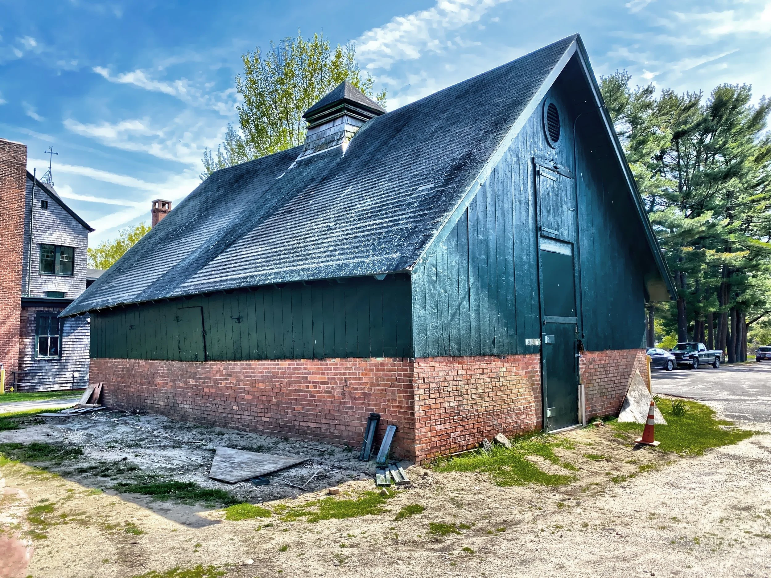  The Ice House was built in the late 1800’s before electricity.  The ice required to keep food and beverages cold was stored here in layers.  The top was layer was accessed by the highest door and then they would work their way down.  The gin mint co