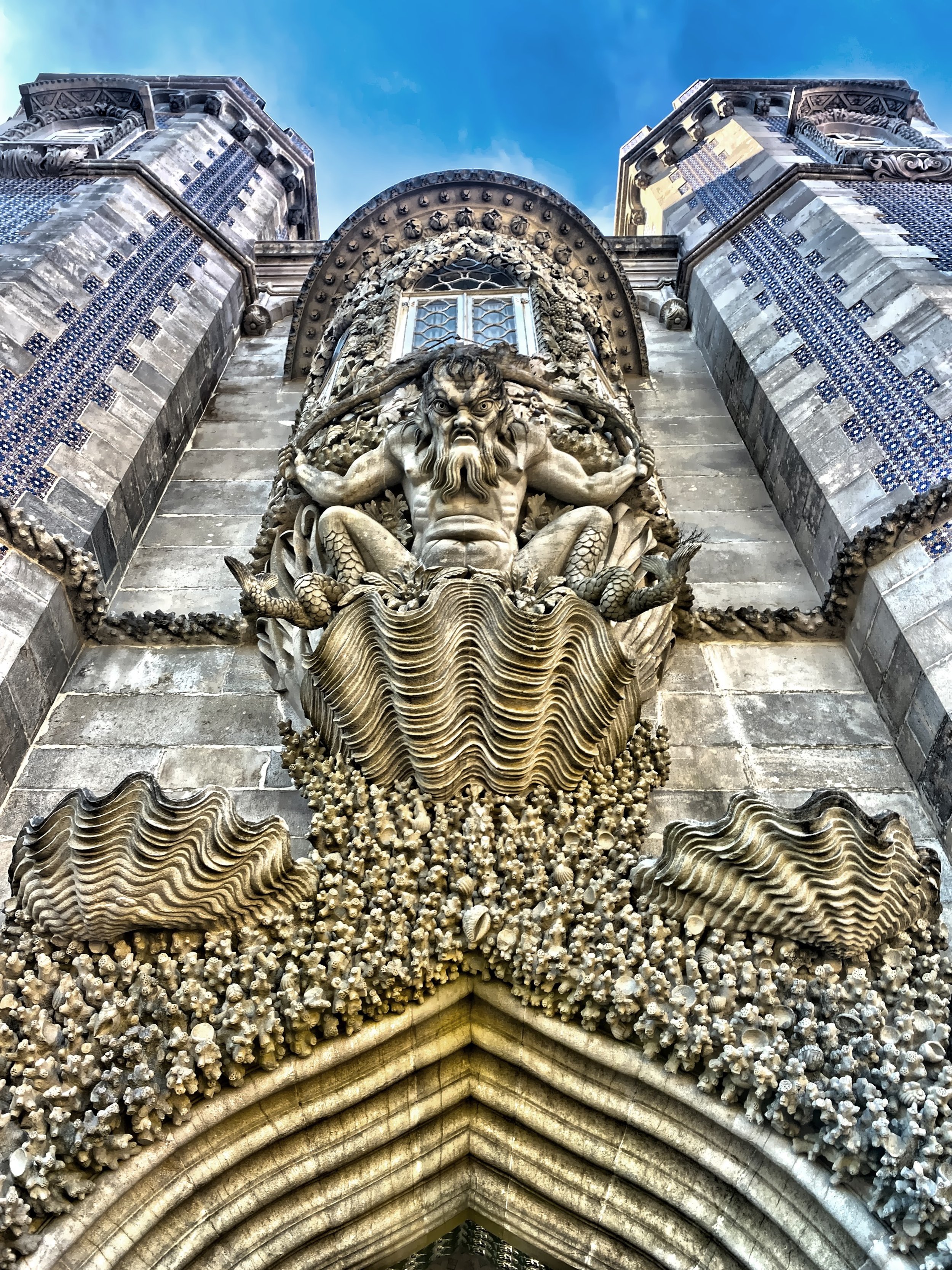  A statue of Triton guards the entrance into the palace 